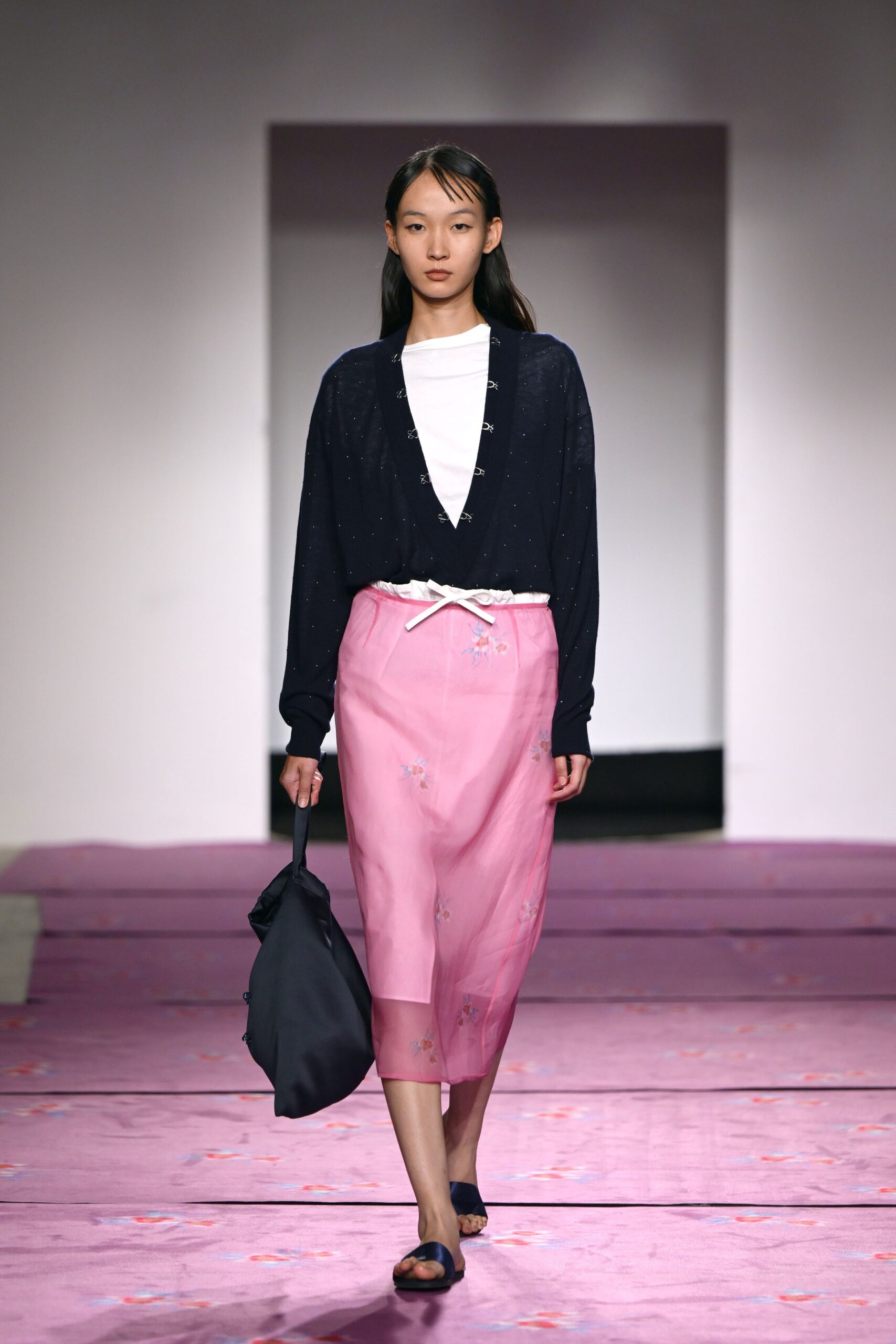 white blouse pink embroidered skirt