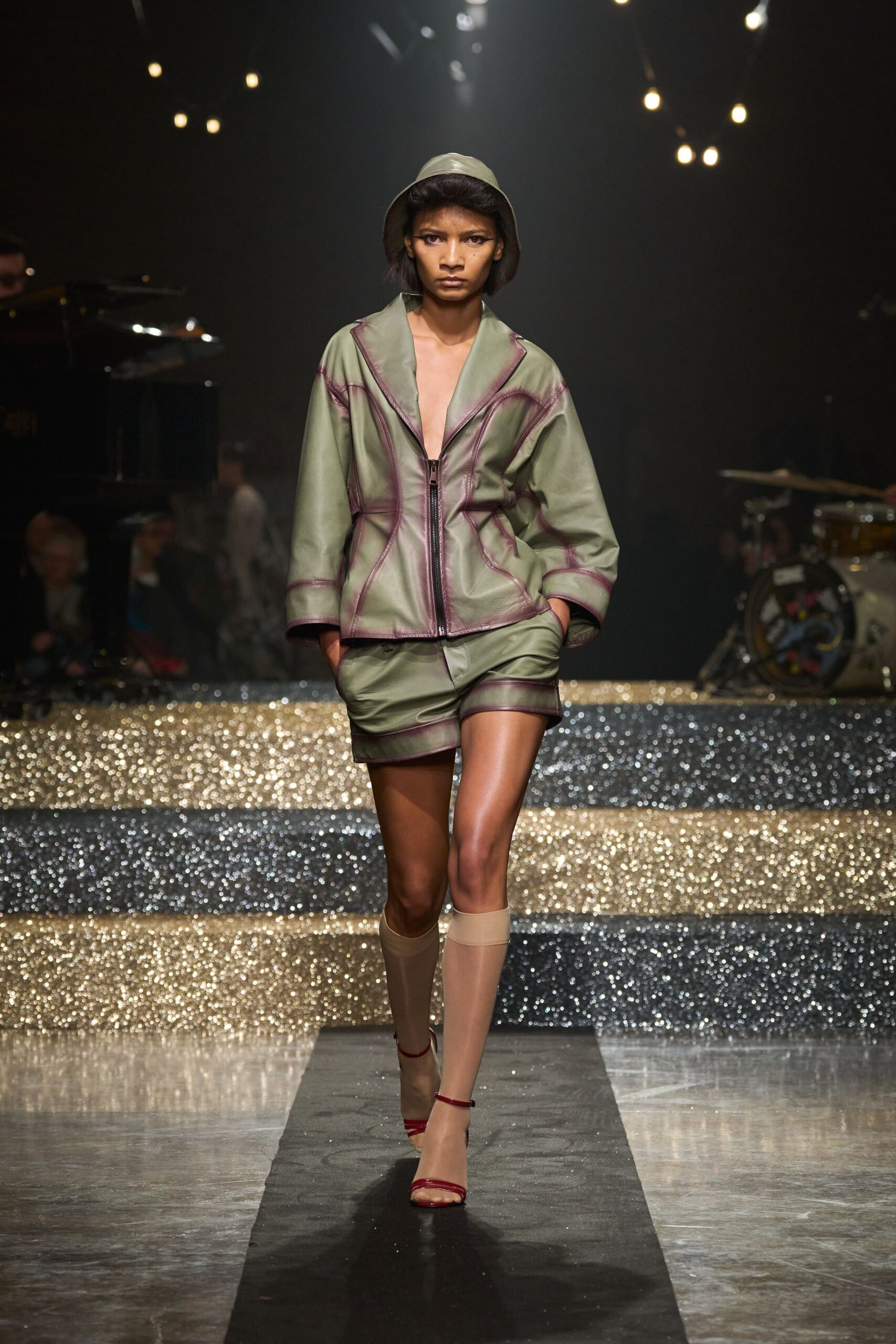 green jacket mini skirt outfit