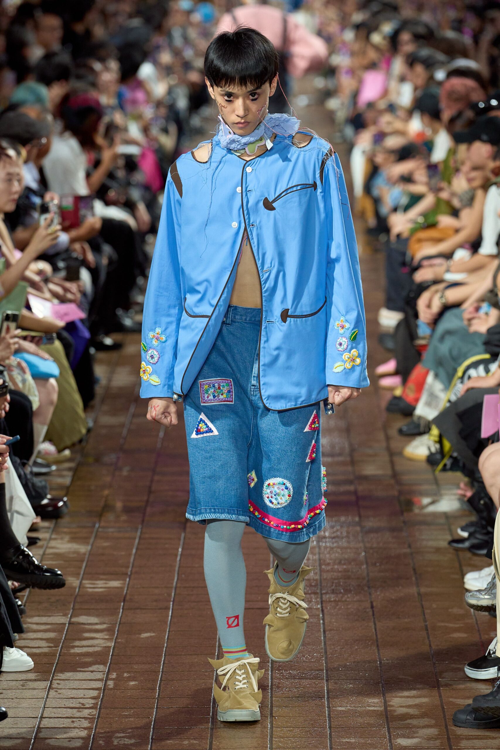 blue embroidered jacket with denim skirt