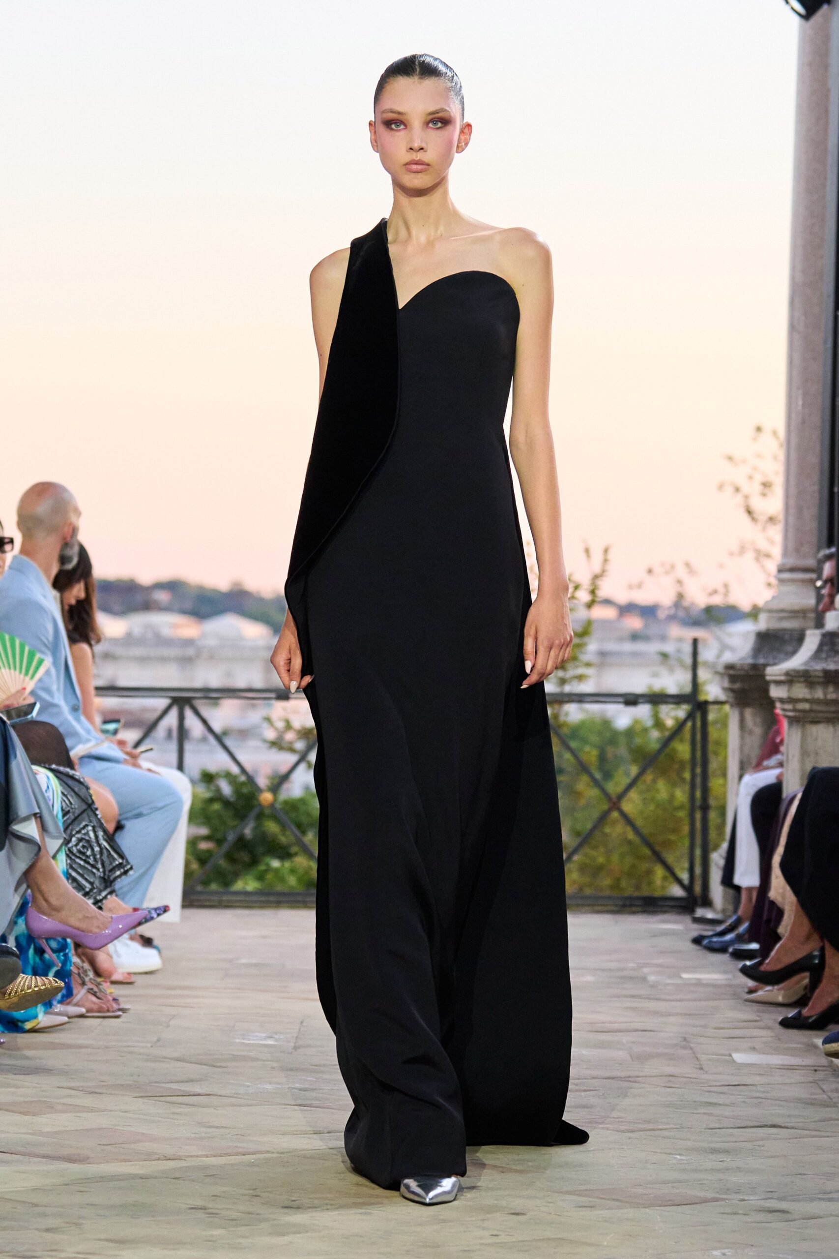 black strapless draped gown
