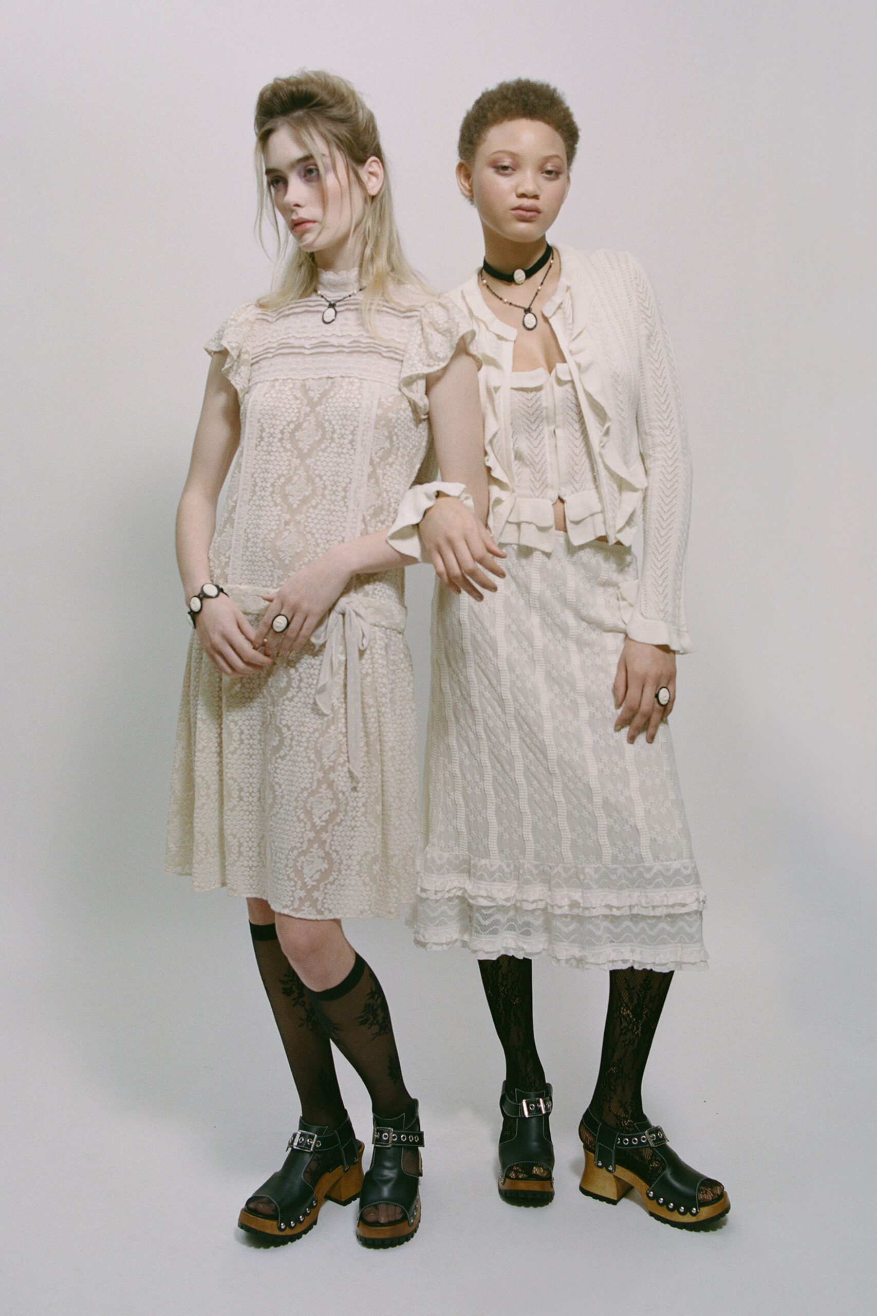white knit sleeveless v-neck relaxed layered ruffled dress