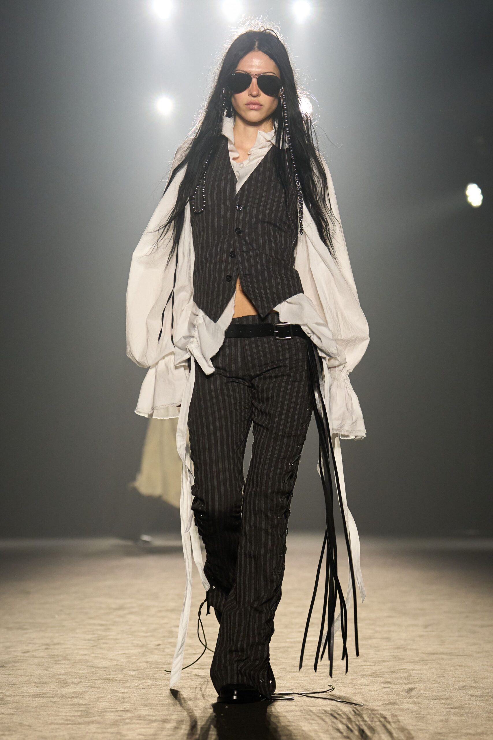 black and white striped vest with relaxed shirt