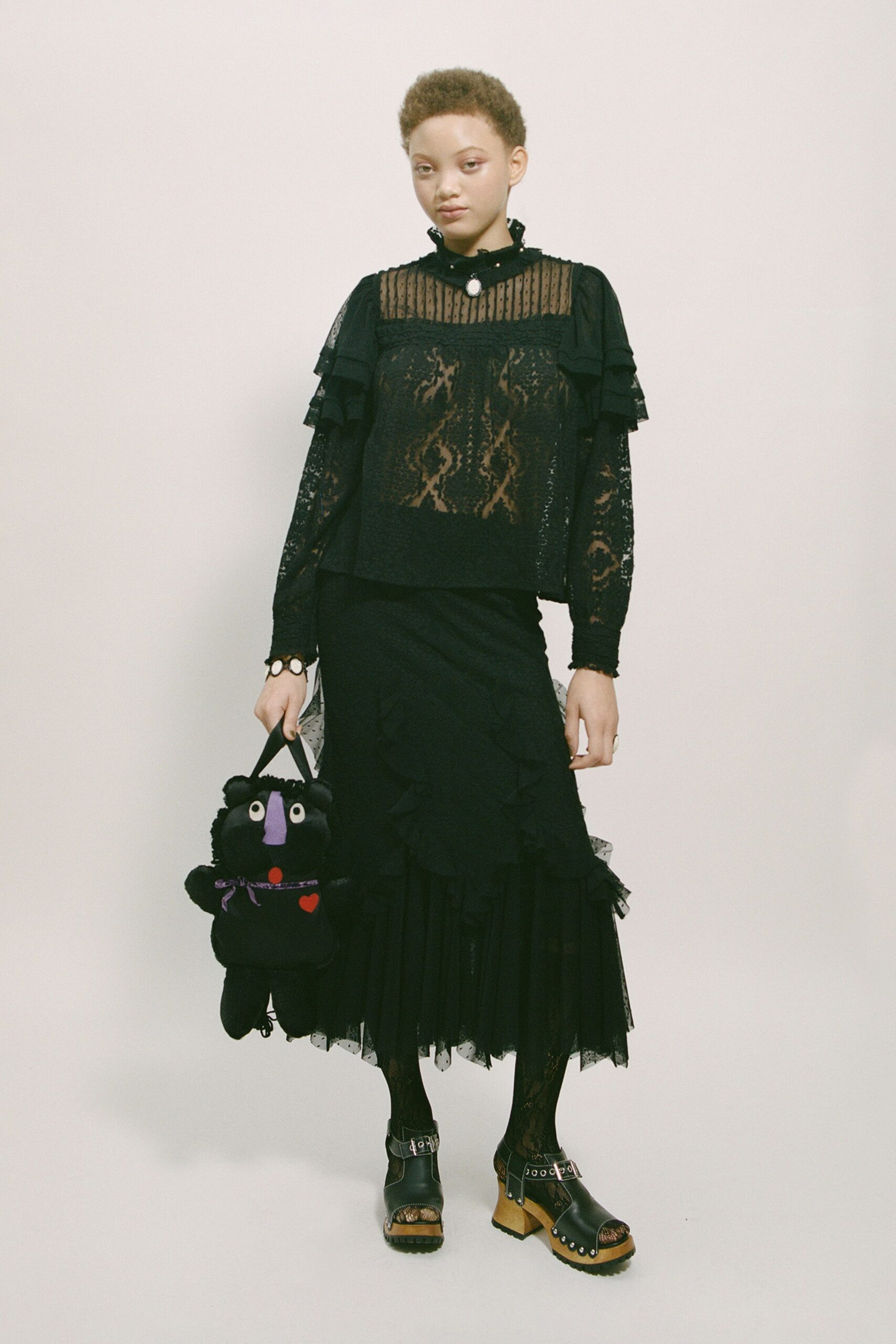 black lace long-sleeve high-neck relaxed ruffled layered blouse