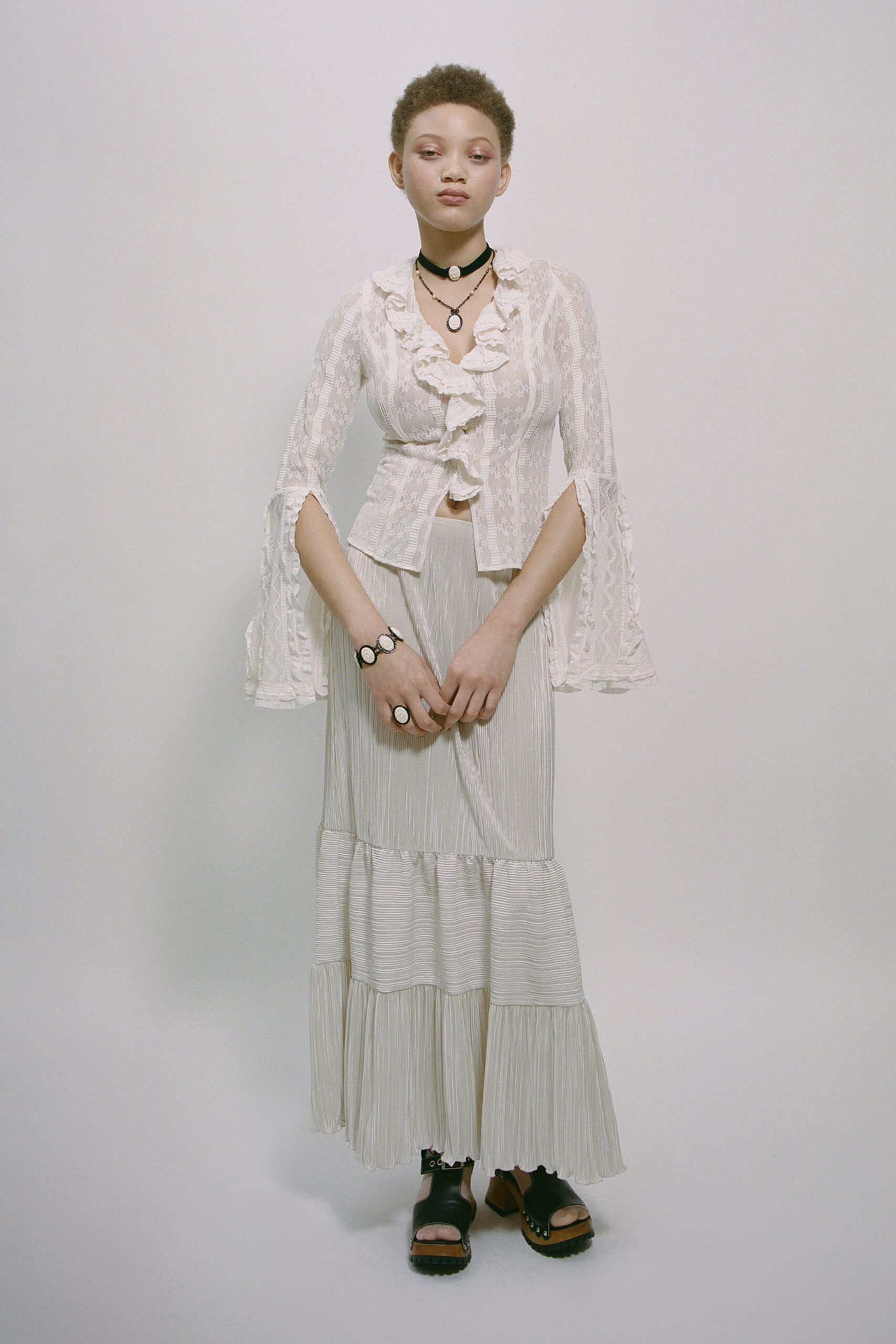 white lace long-sleeve v-neck fitted ruffled layered blouse