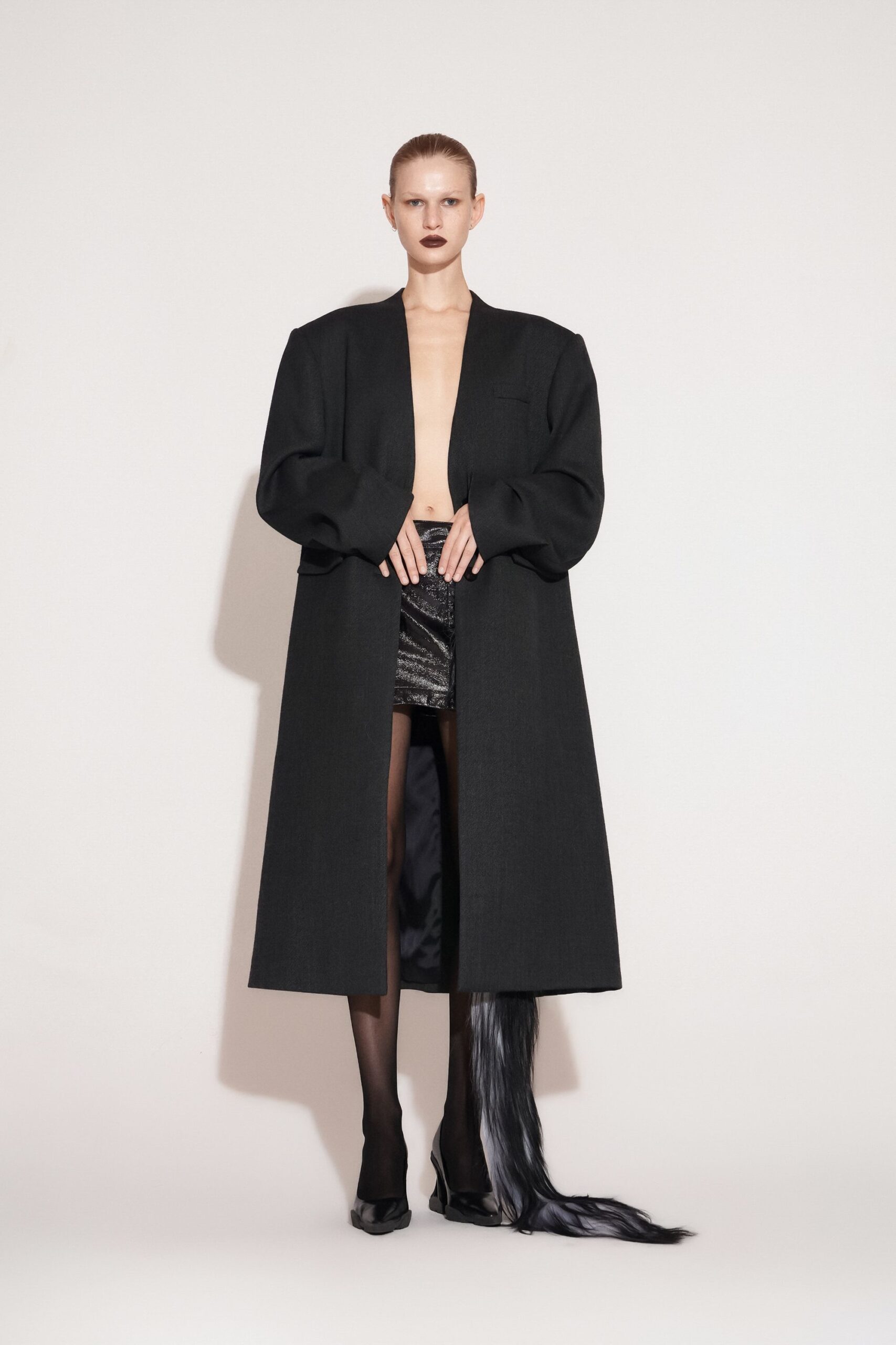 black wool long-sleeve collared oversized buttoned maxi coat