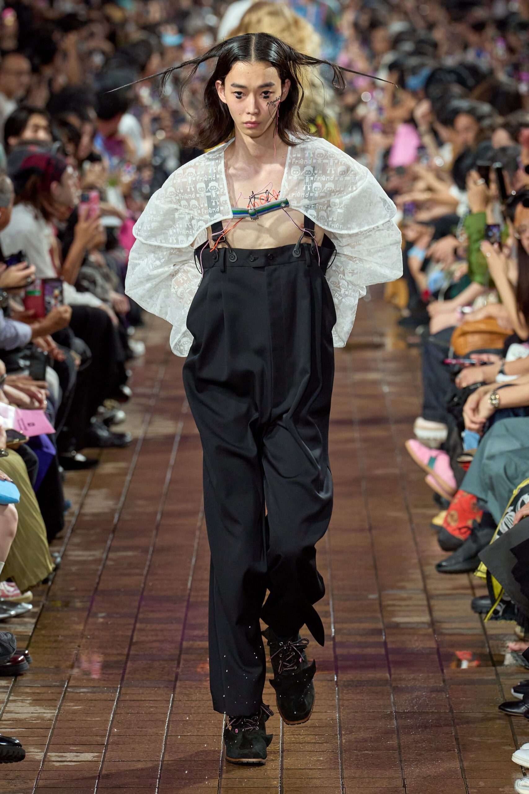 white relaxed blouse with black overalls