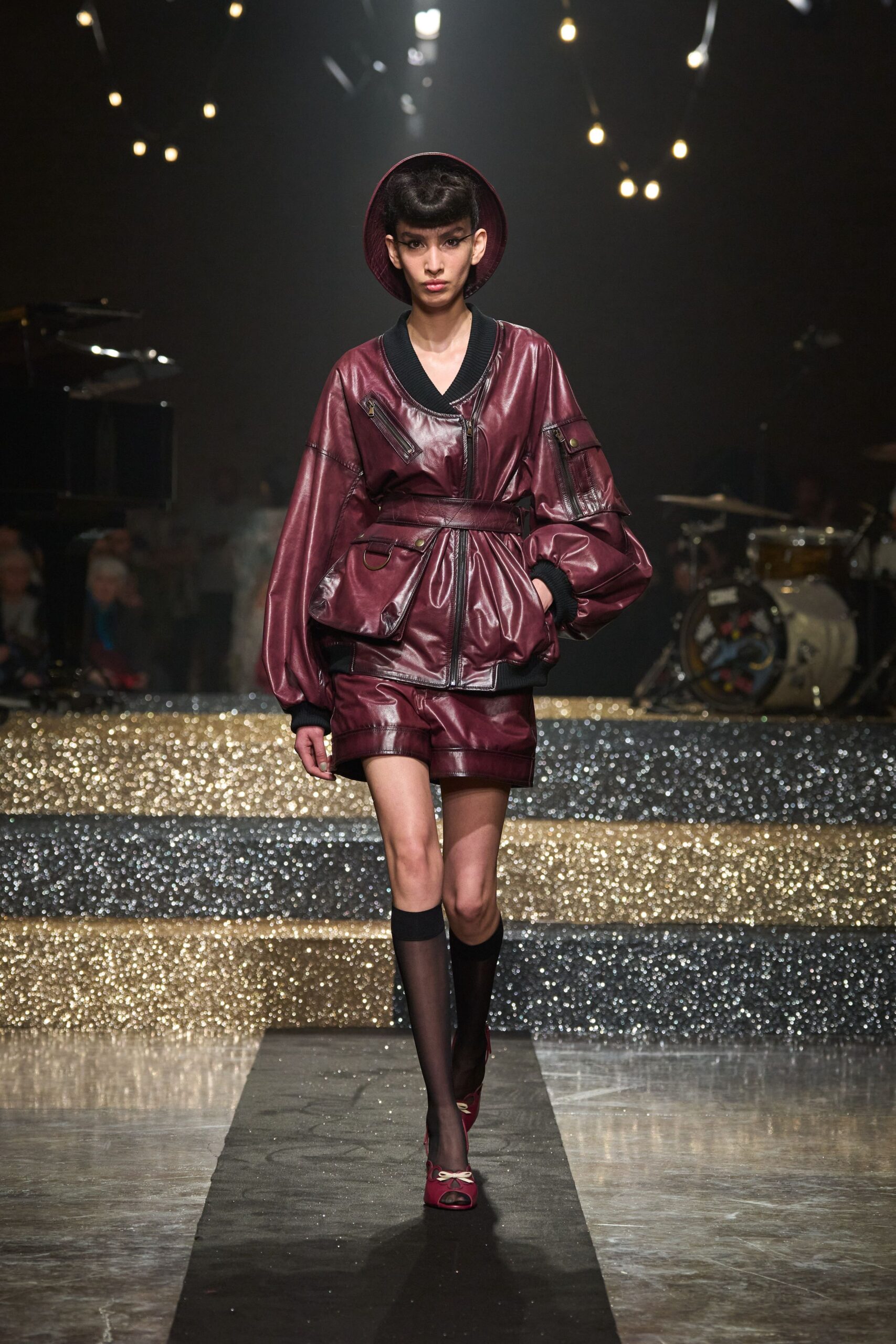maroon leather oversized jacket and shorts