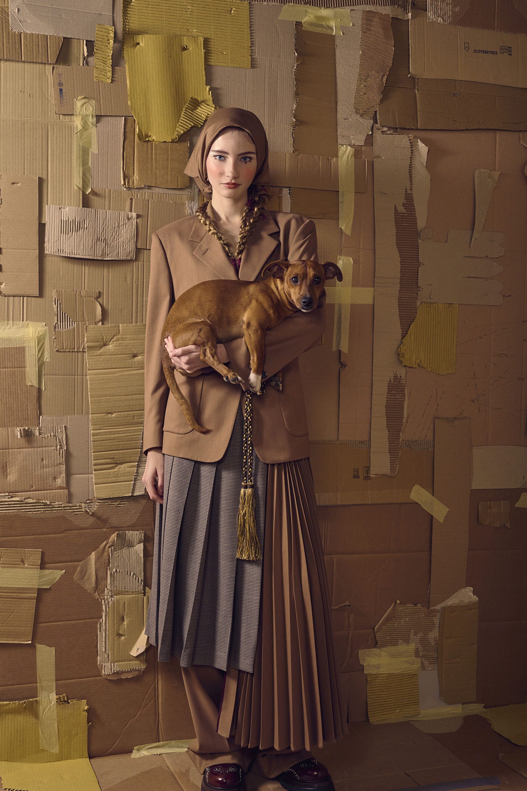 brown tailored blazer with pleated skirt