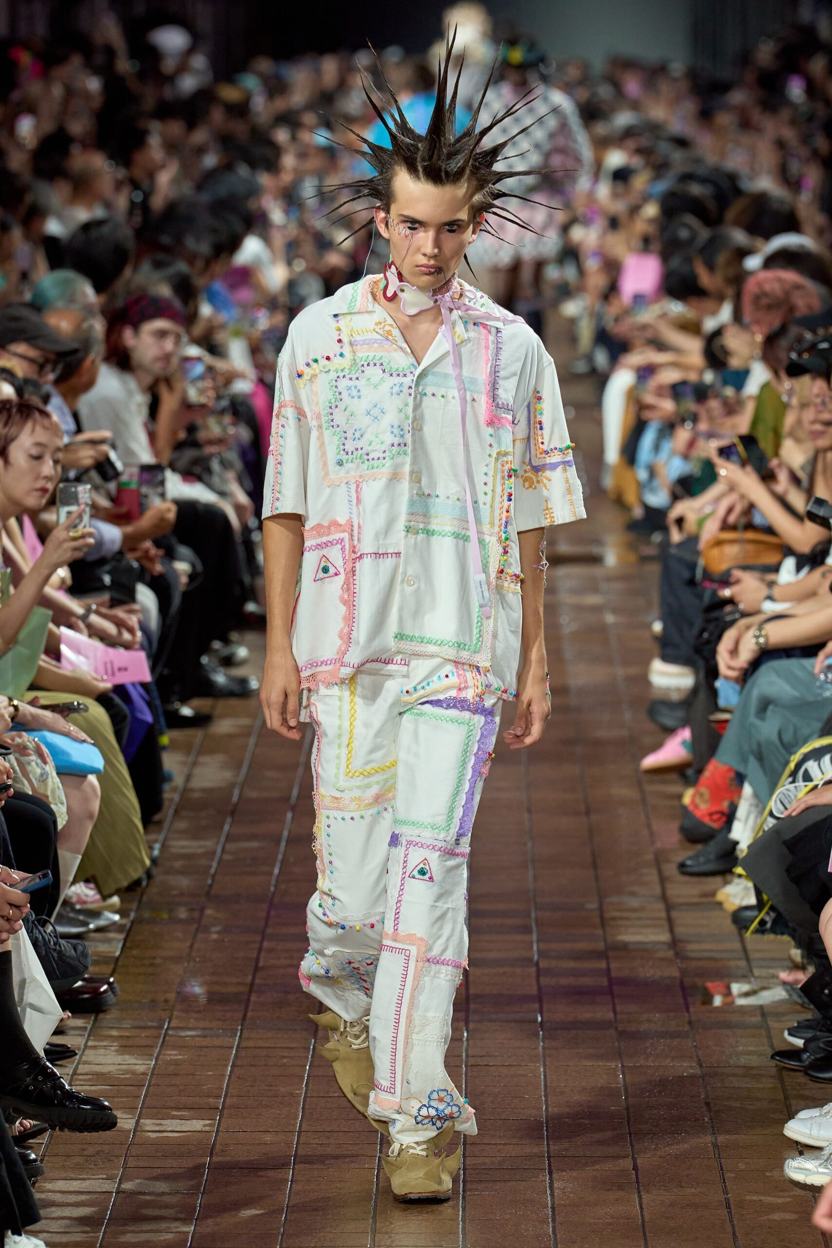 embroidered white shirt and pants
