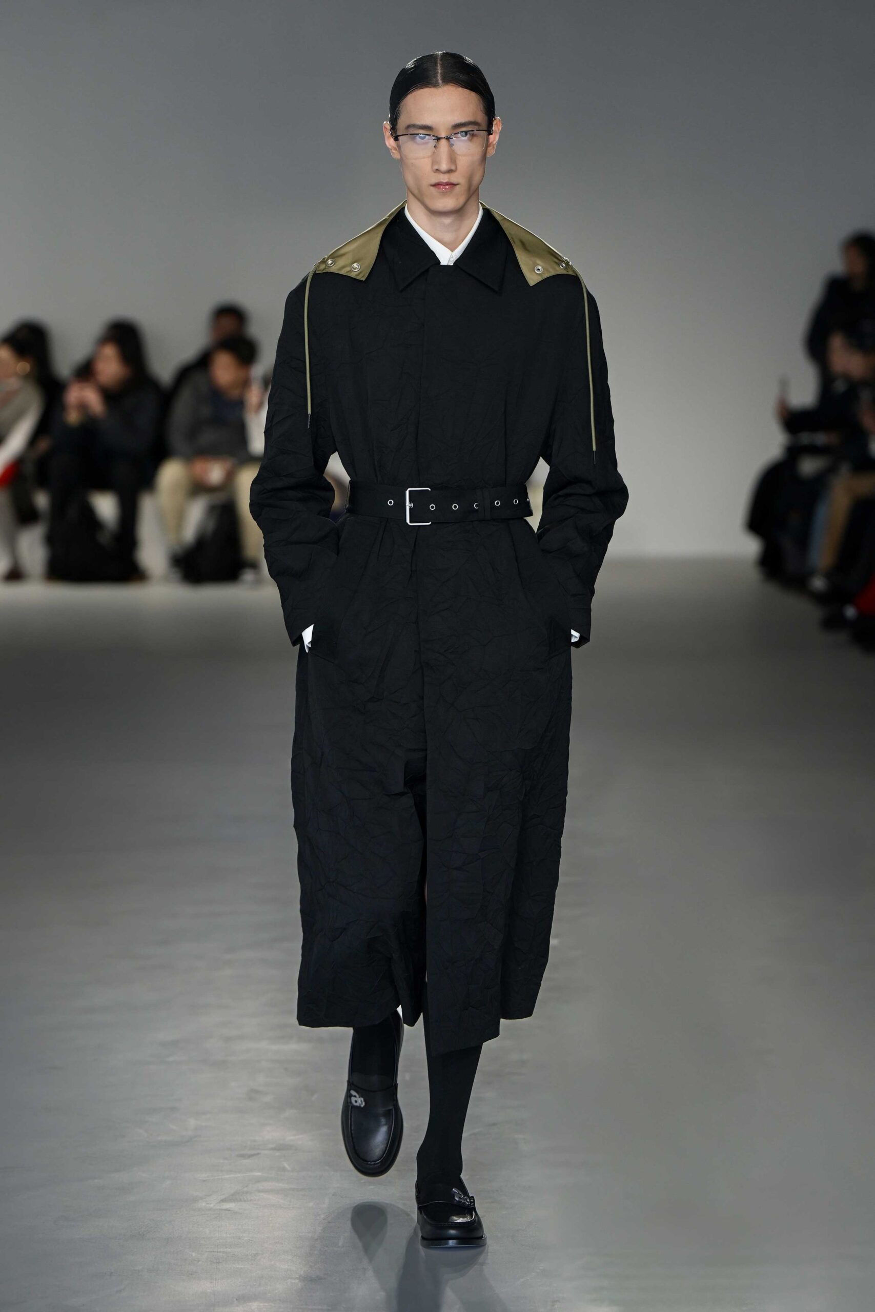 black cotton long-sleeve collared fitted belted quilted coat
