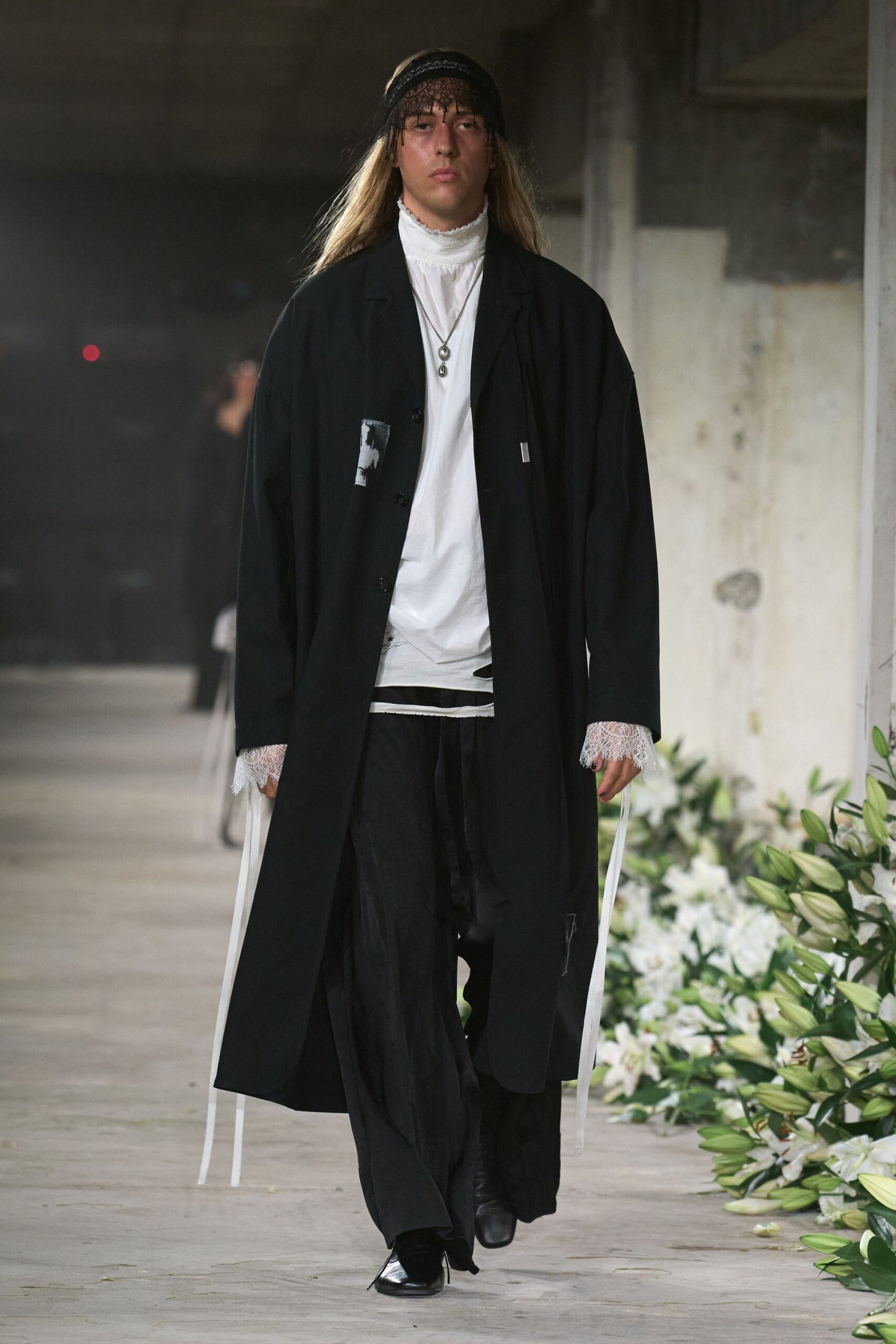 black coat white shirt relaxed pants