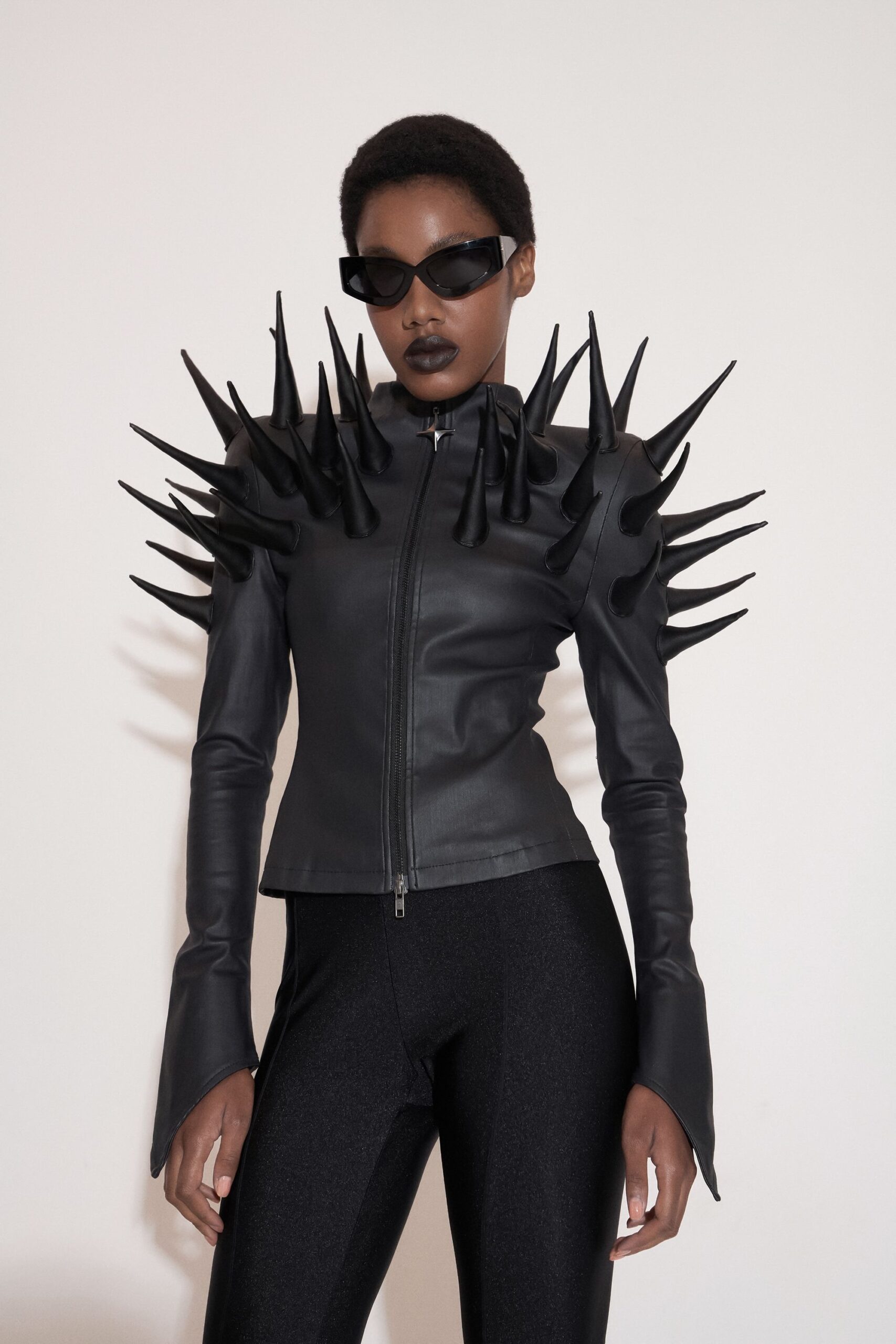 black vinyl slim straight-leg shiny pants