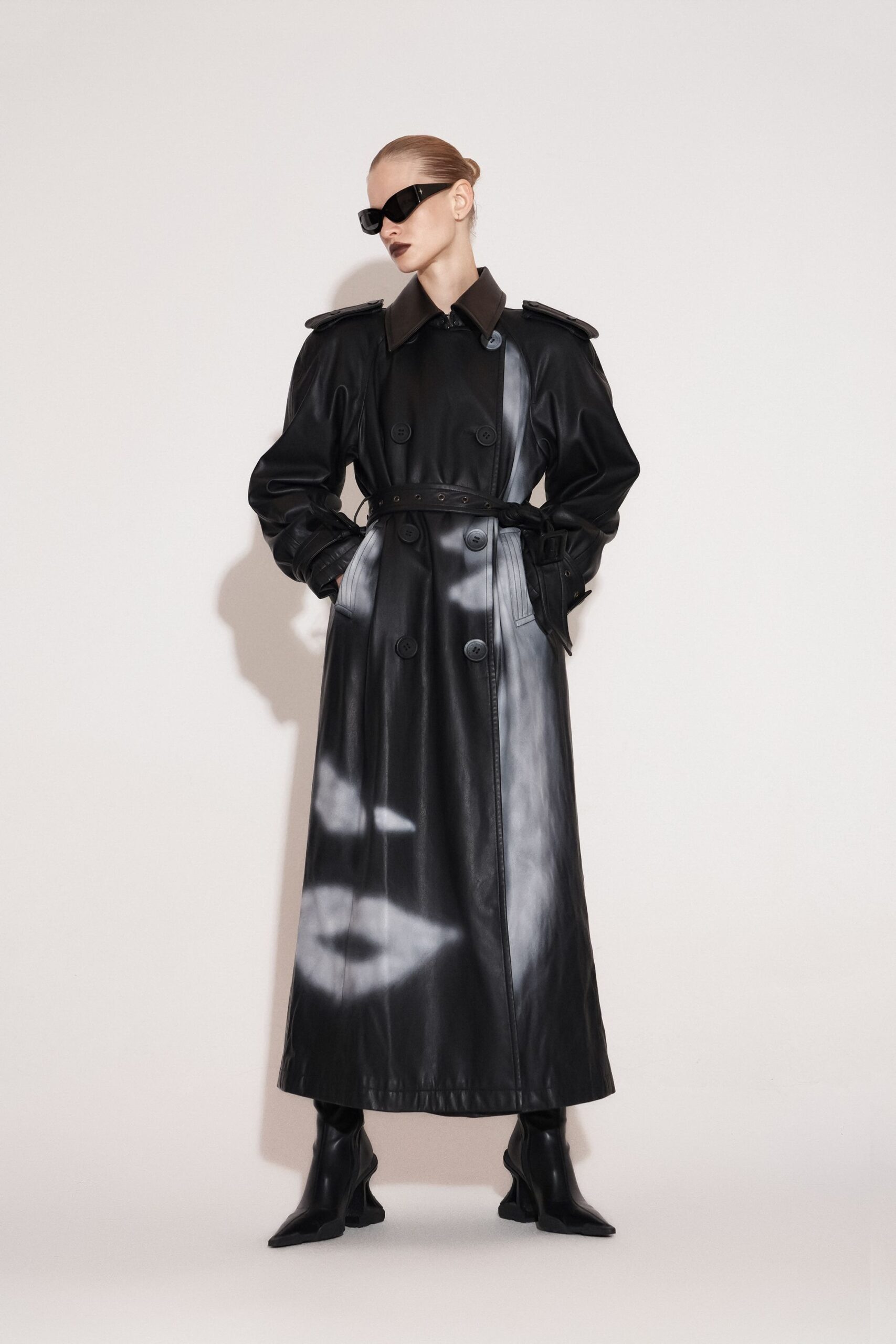 black leather long-sleeve collared fitted belted zippered trench