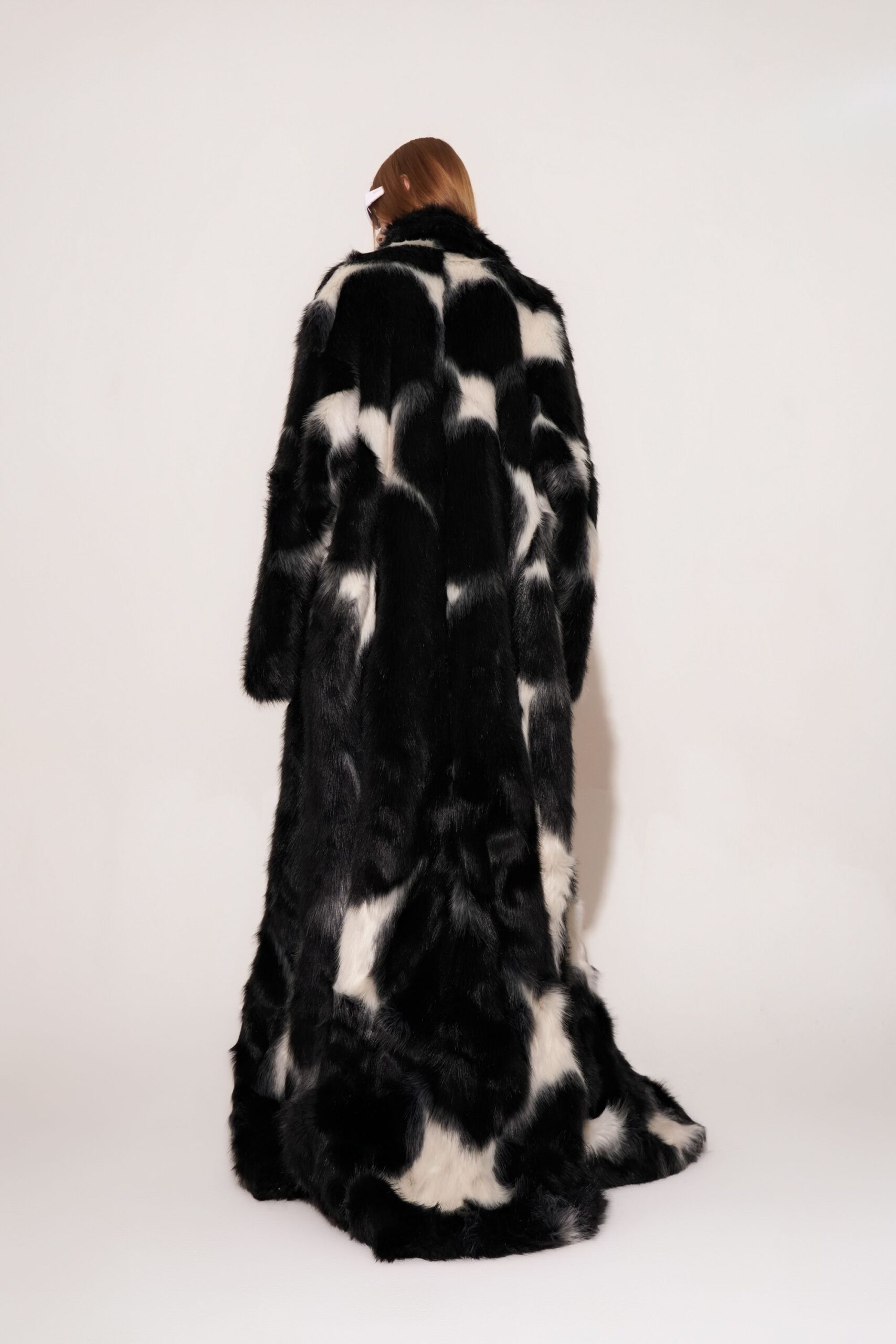 black and white faux-fur coat