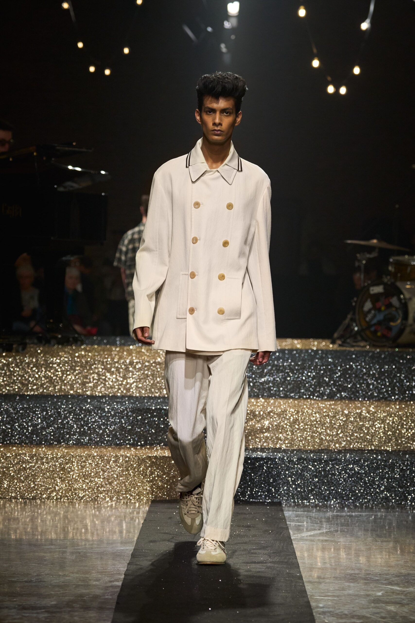 white relaxed jacket beige pants