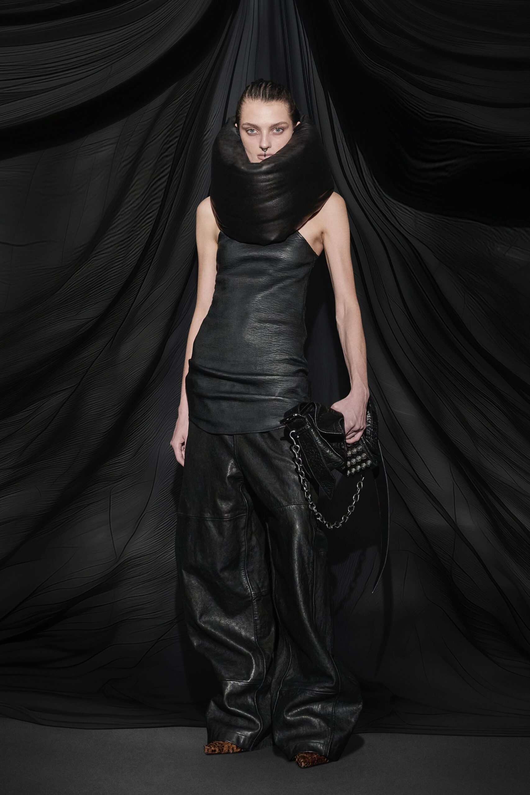 black leather sleeveless top and pants