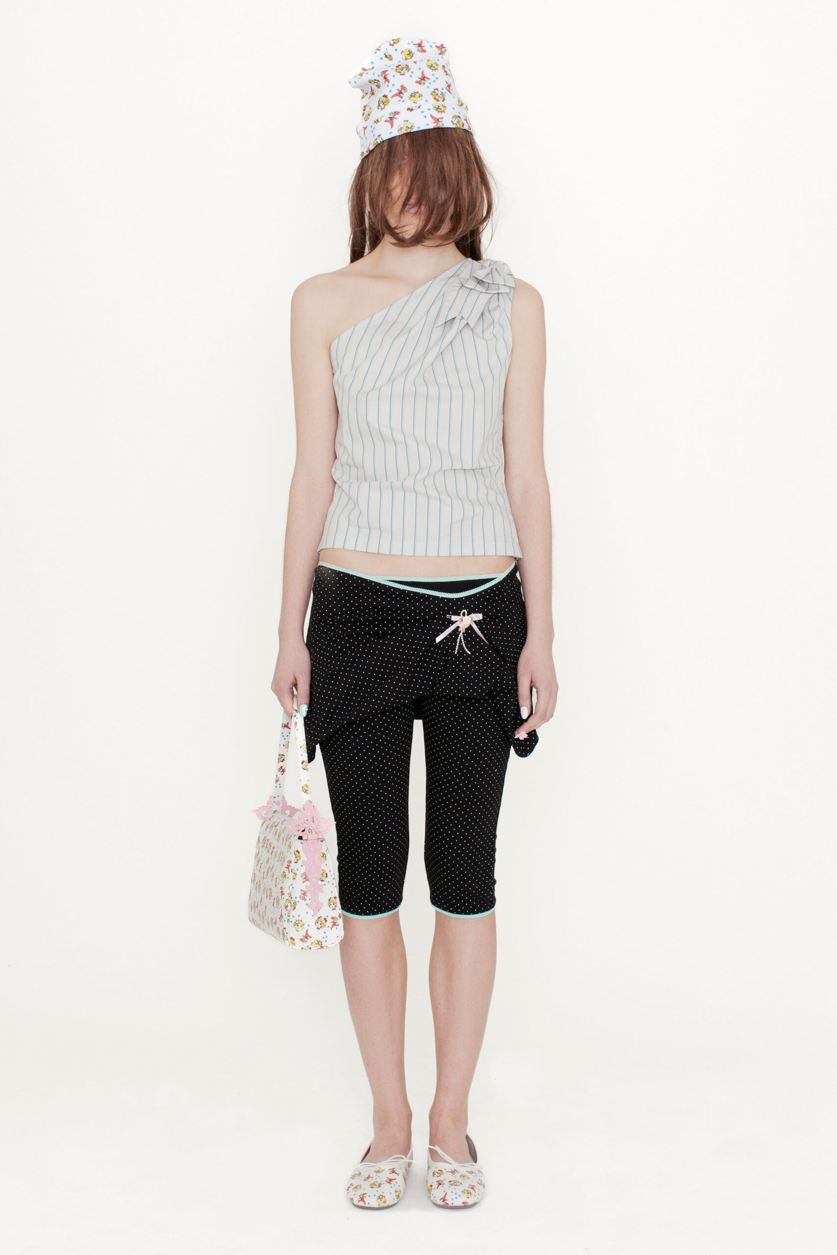 asymmetric striped top with polka-dot pants
