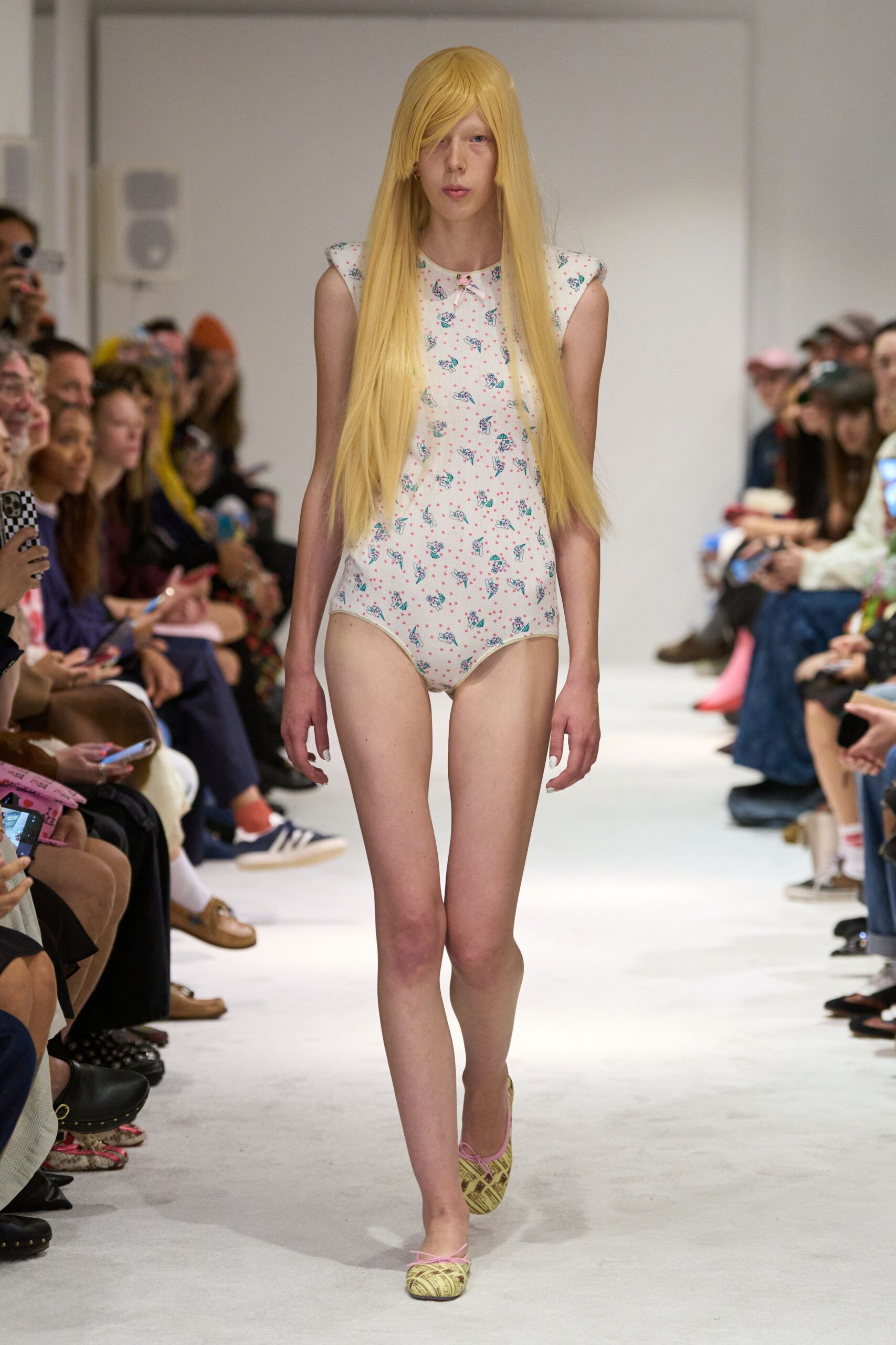 floral bodysuit with beige shoes