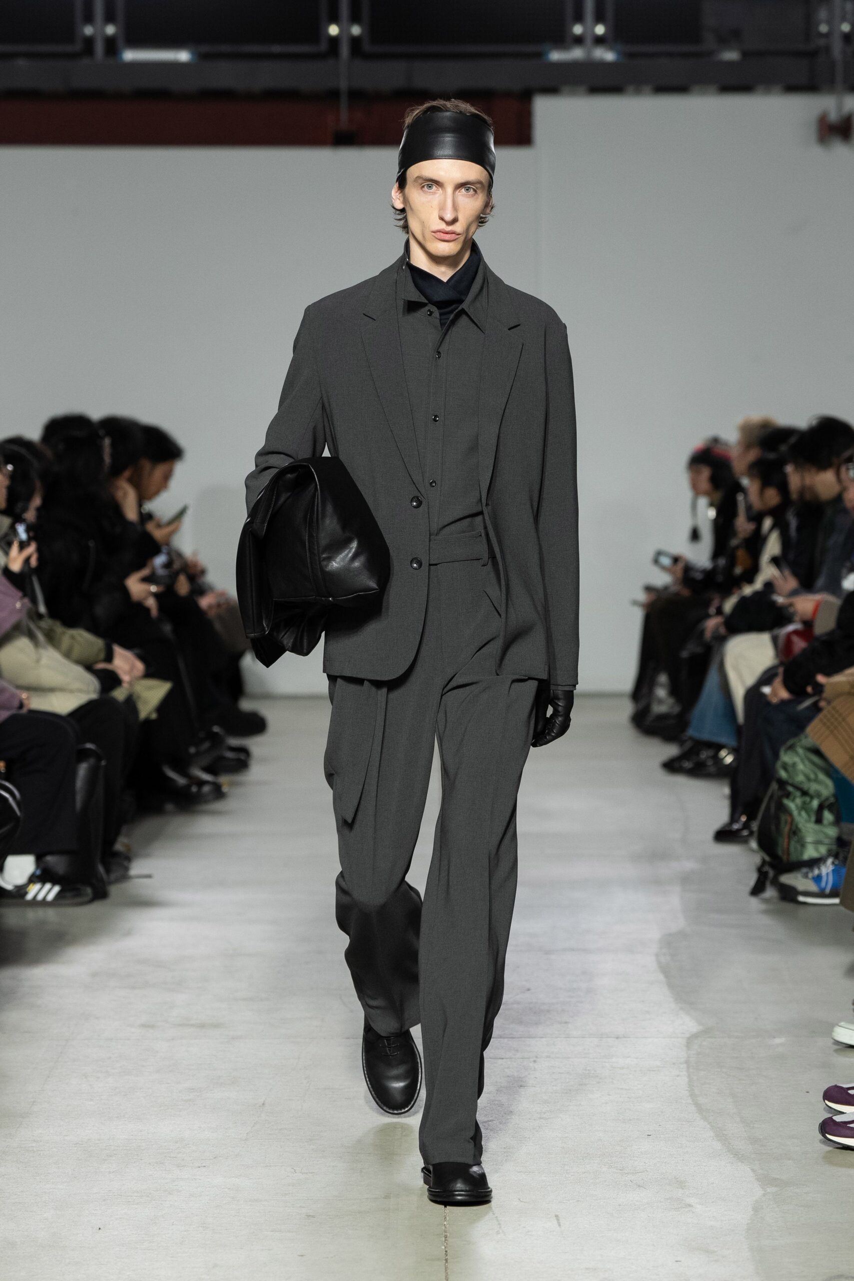 gray tailored suit with black shirt
