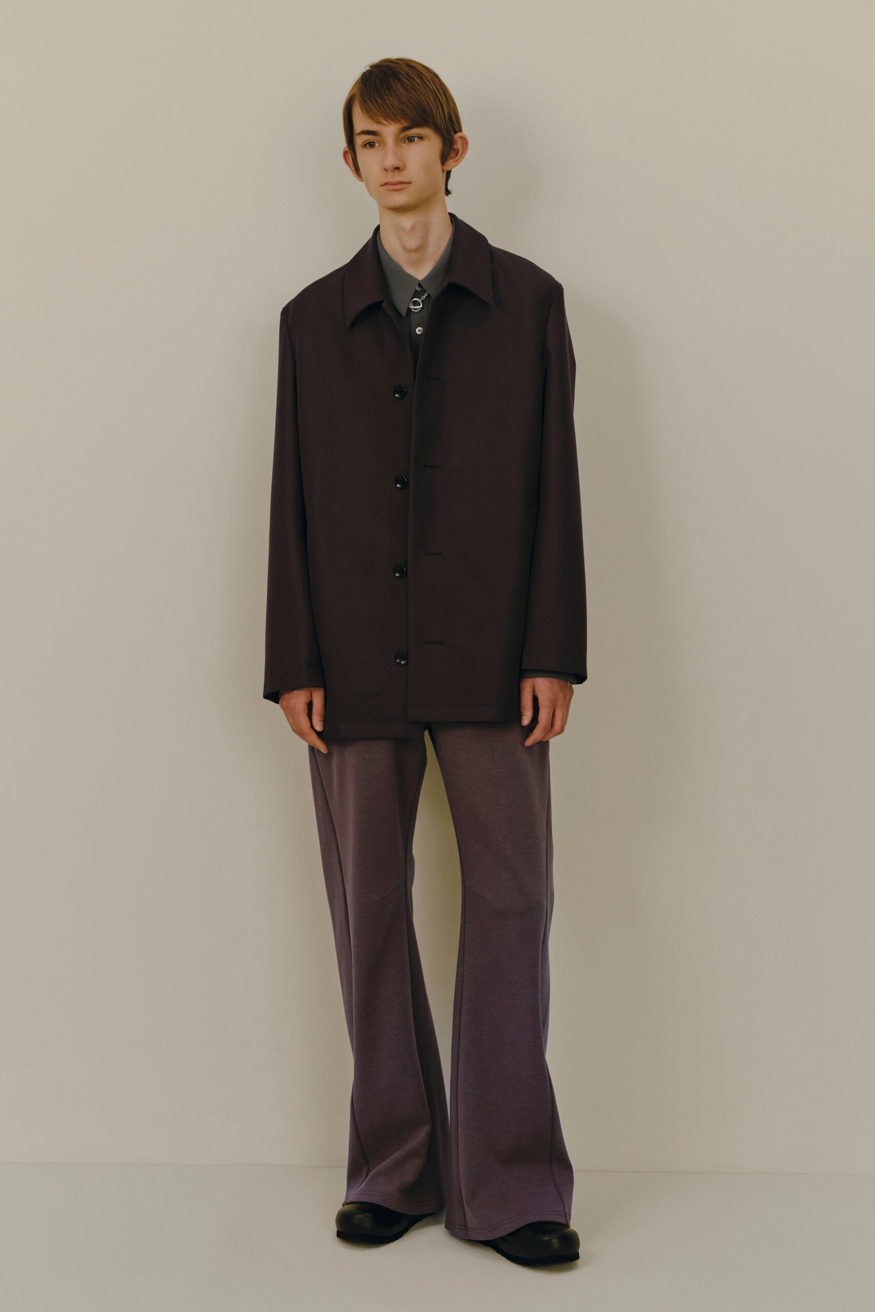 black jacket purple pants
