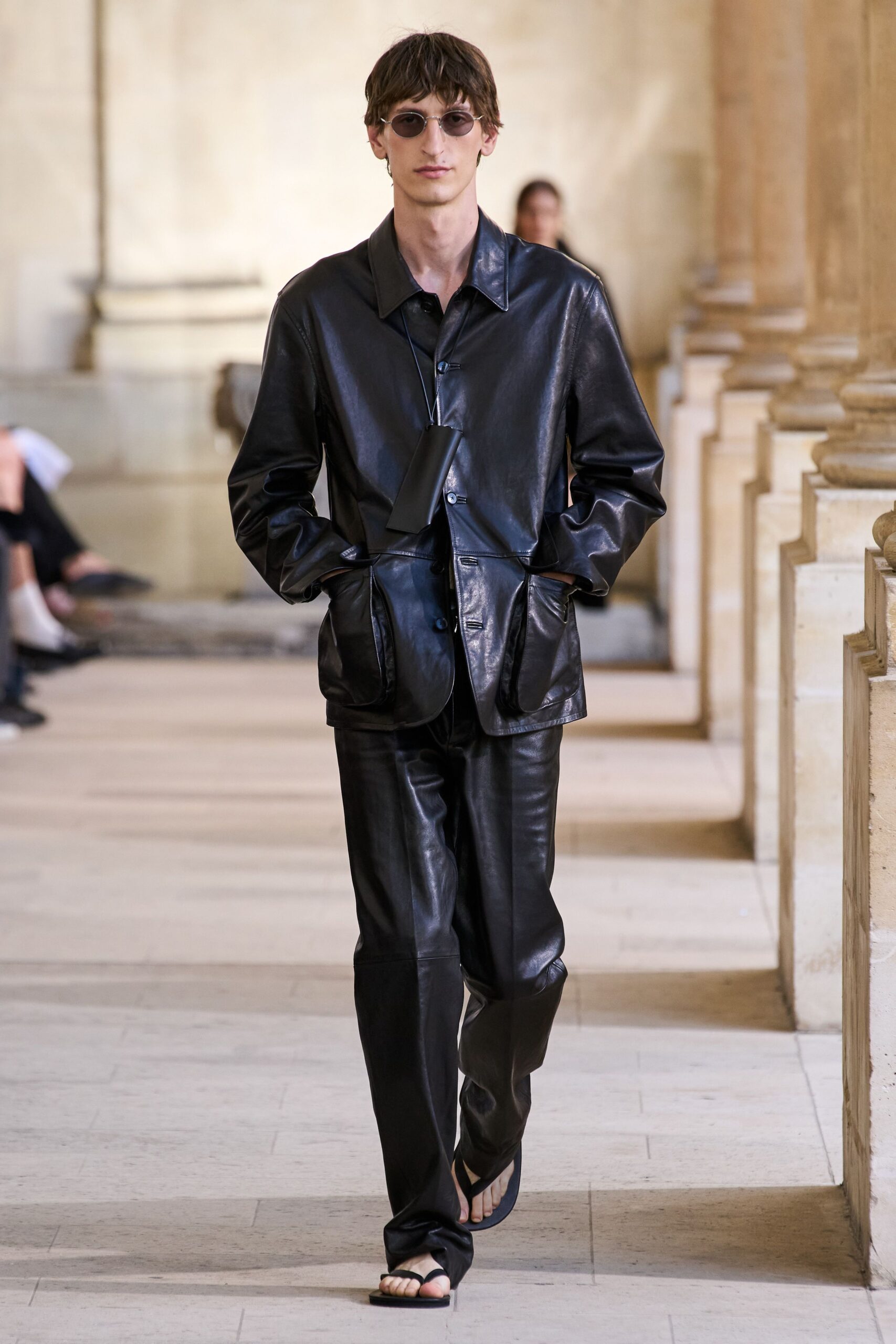 black leather long-sleeve collared oversized buttoned pockets jacket