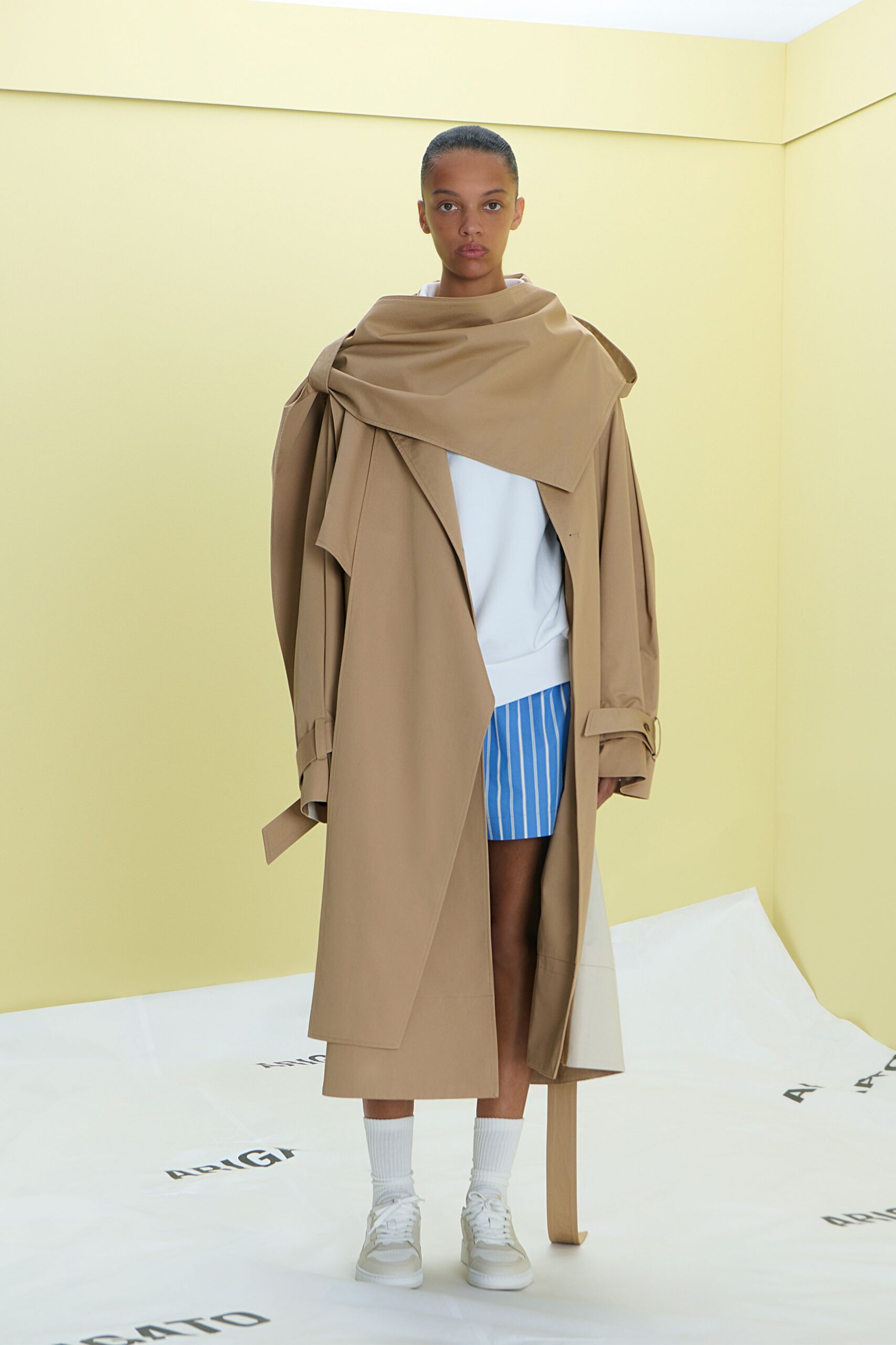 beige trench coat with white sweater