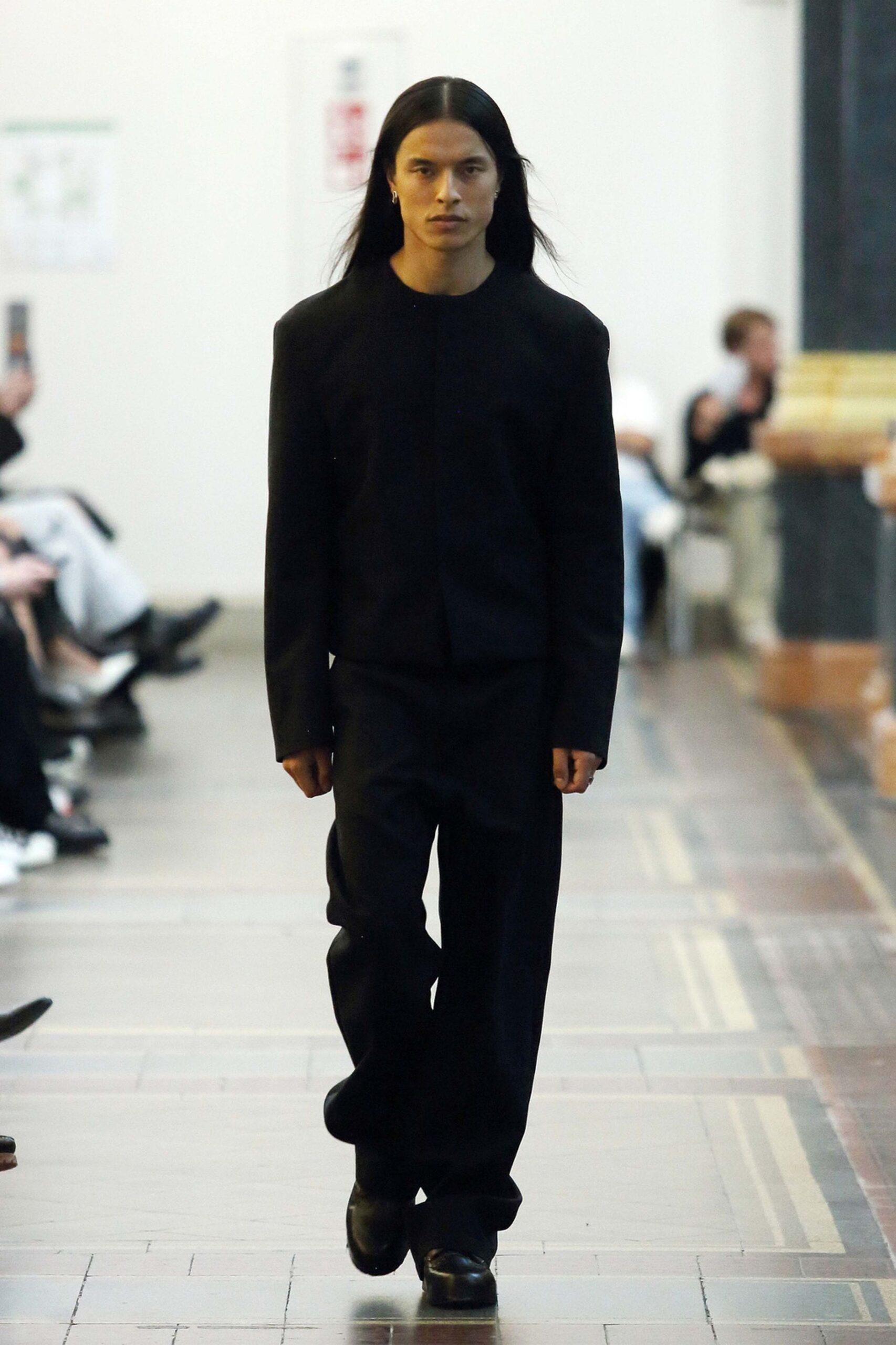 black fitted suit with leather shoes
