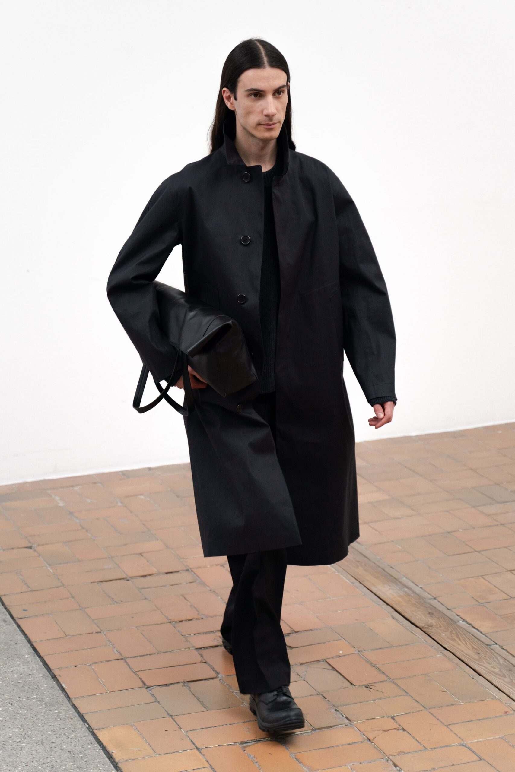 black coat and pants outfit