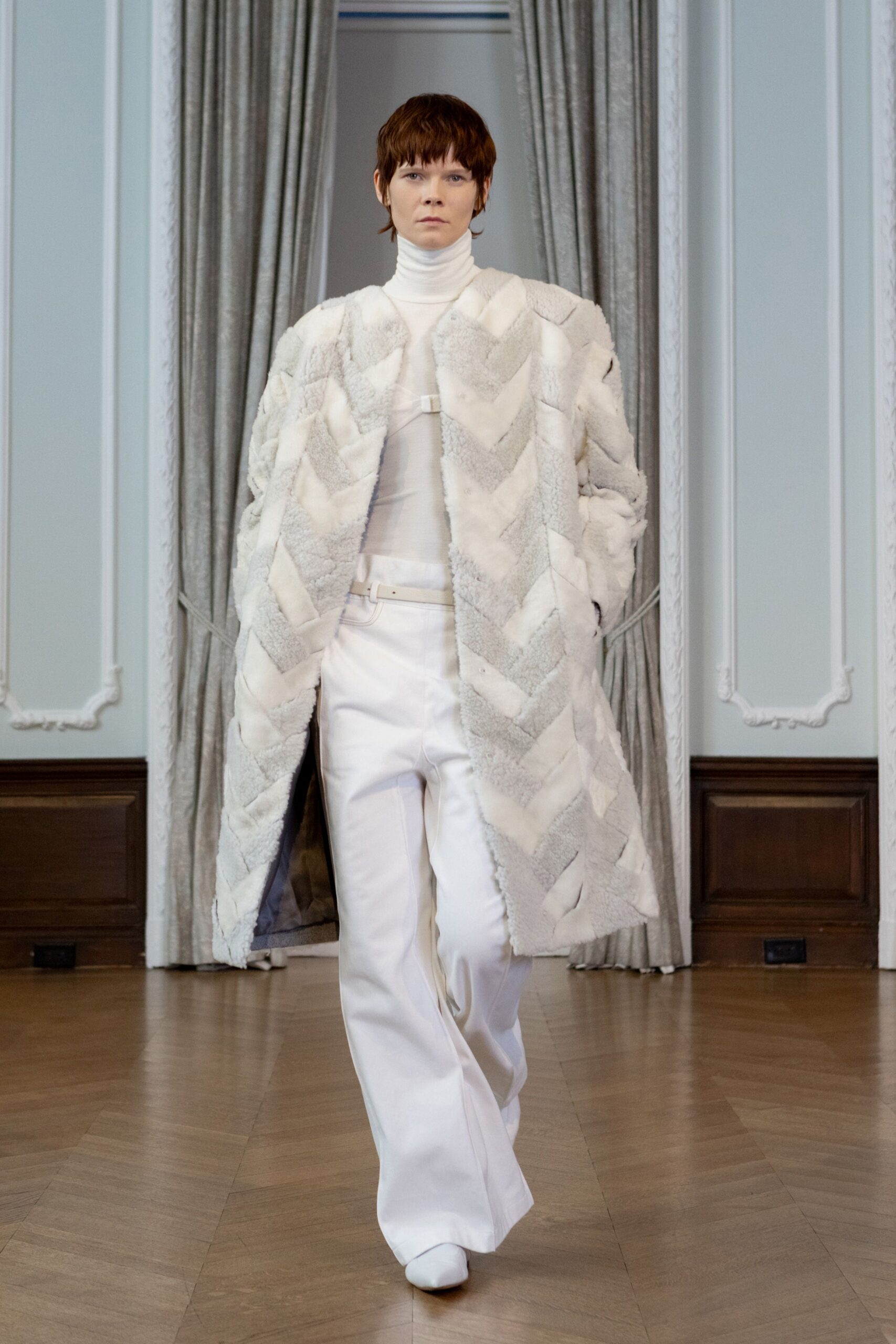 white faux-fur coat with wide-leg pants