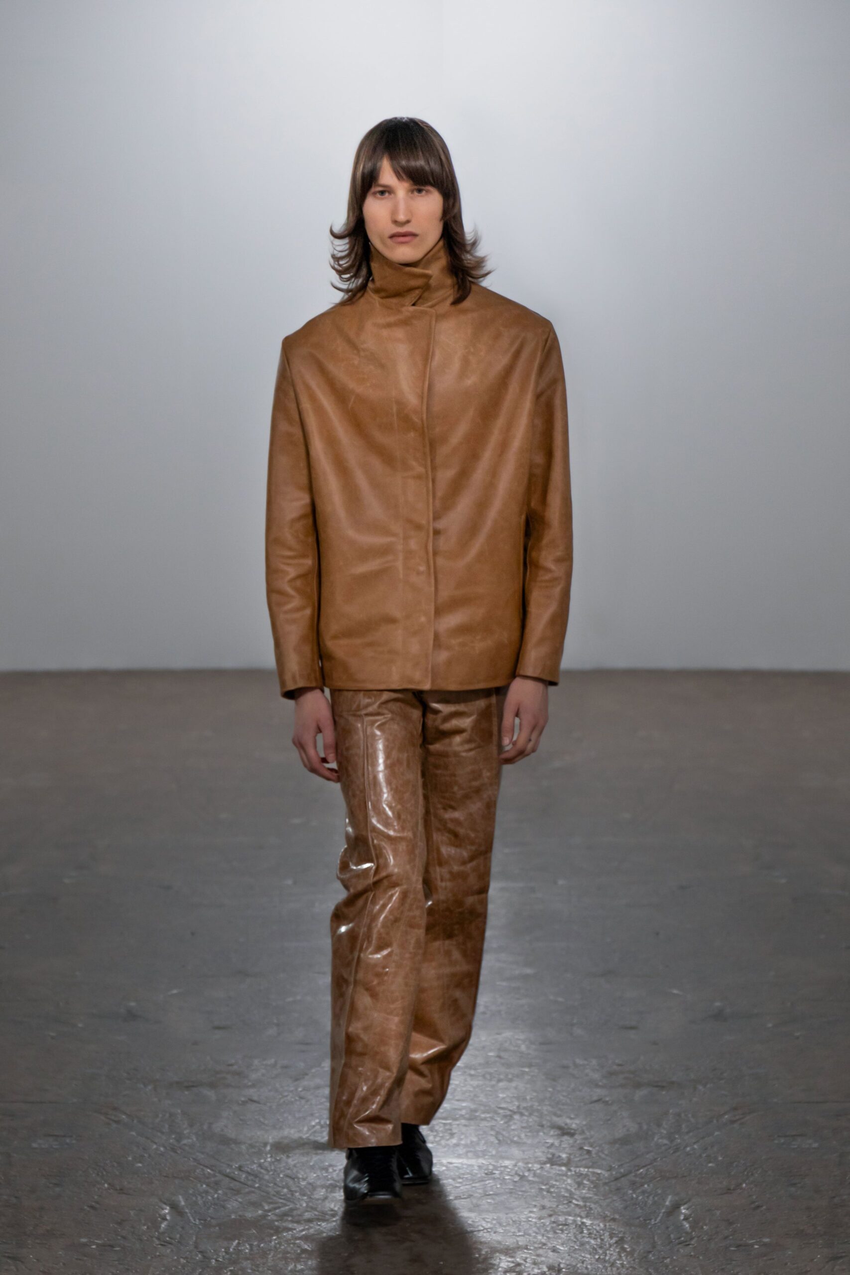 brown leather fitted jacket and pants