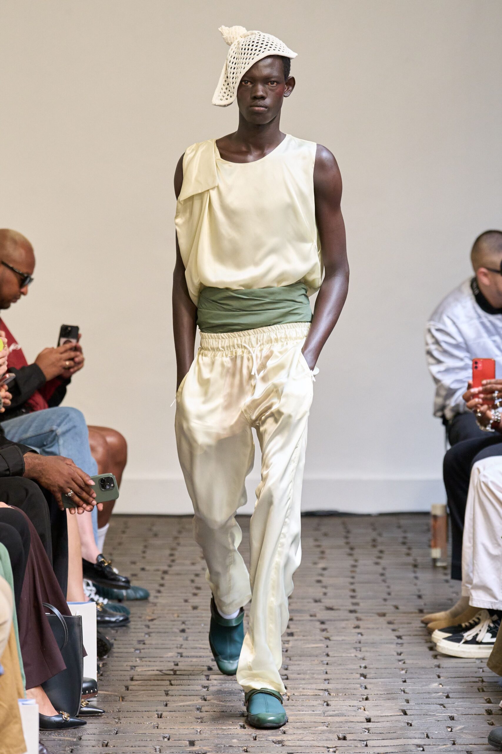 ivory silk top beige pants green shoes