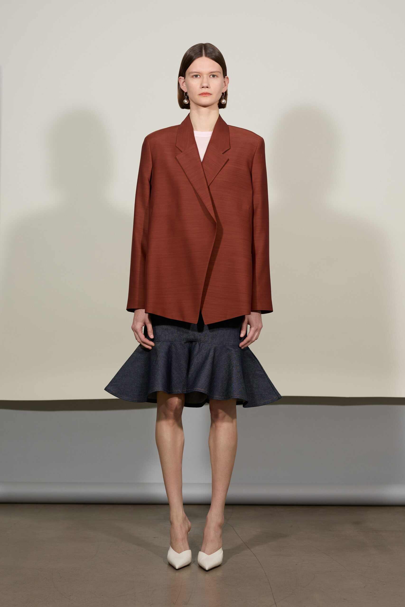 brown blazer blue flared skirt