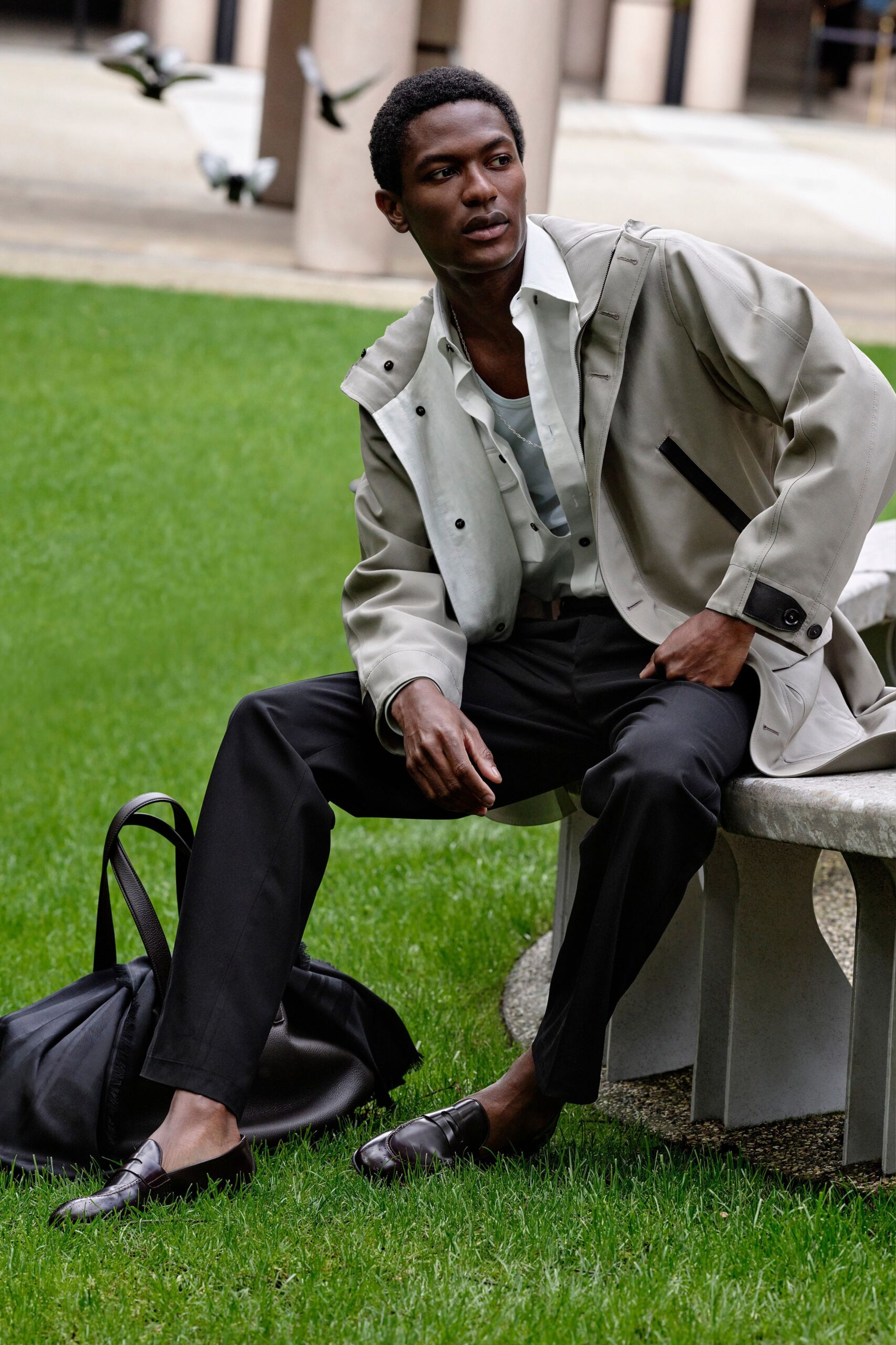 beige jacket white shirt black pants