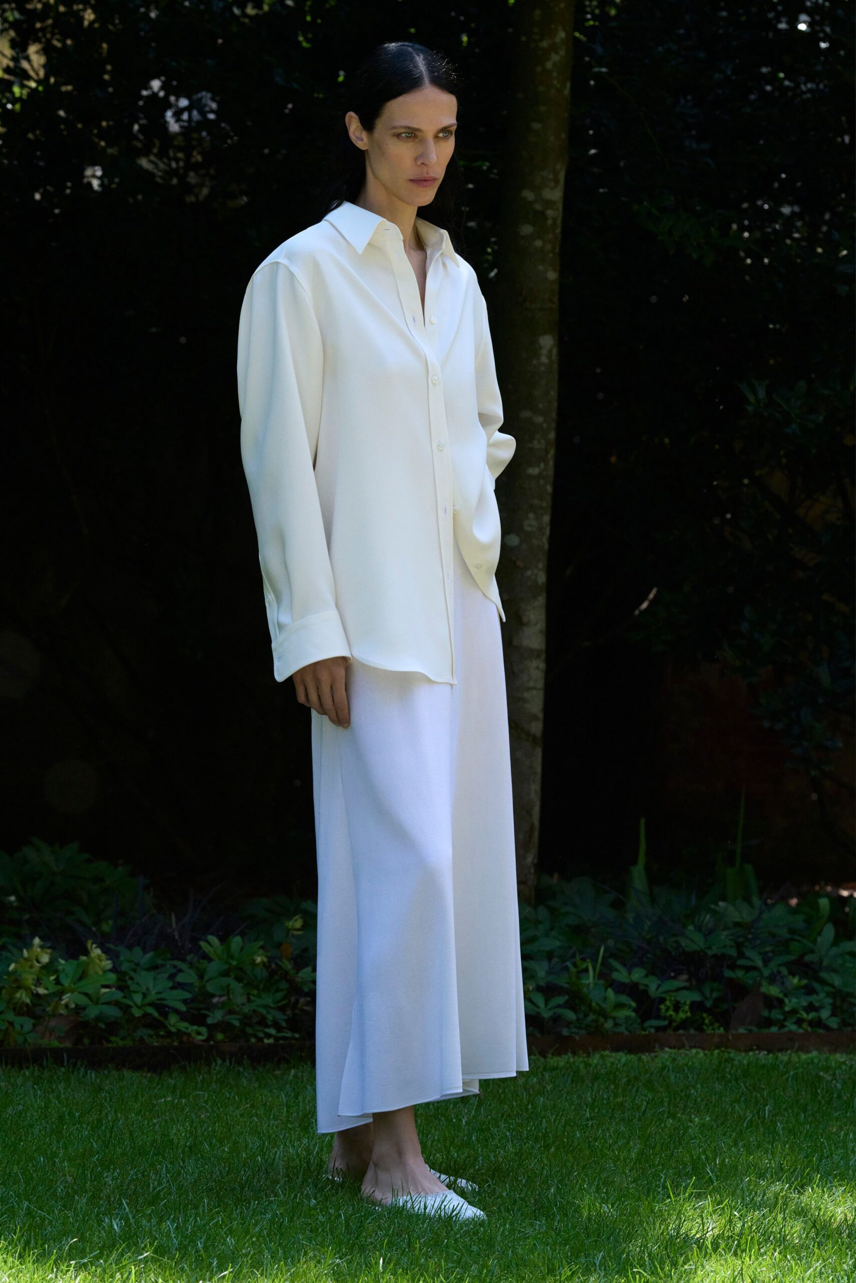 white silk shirt and skirt