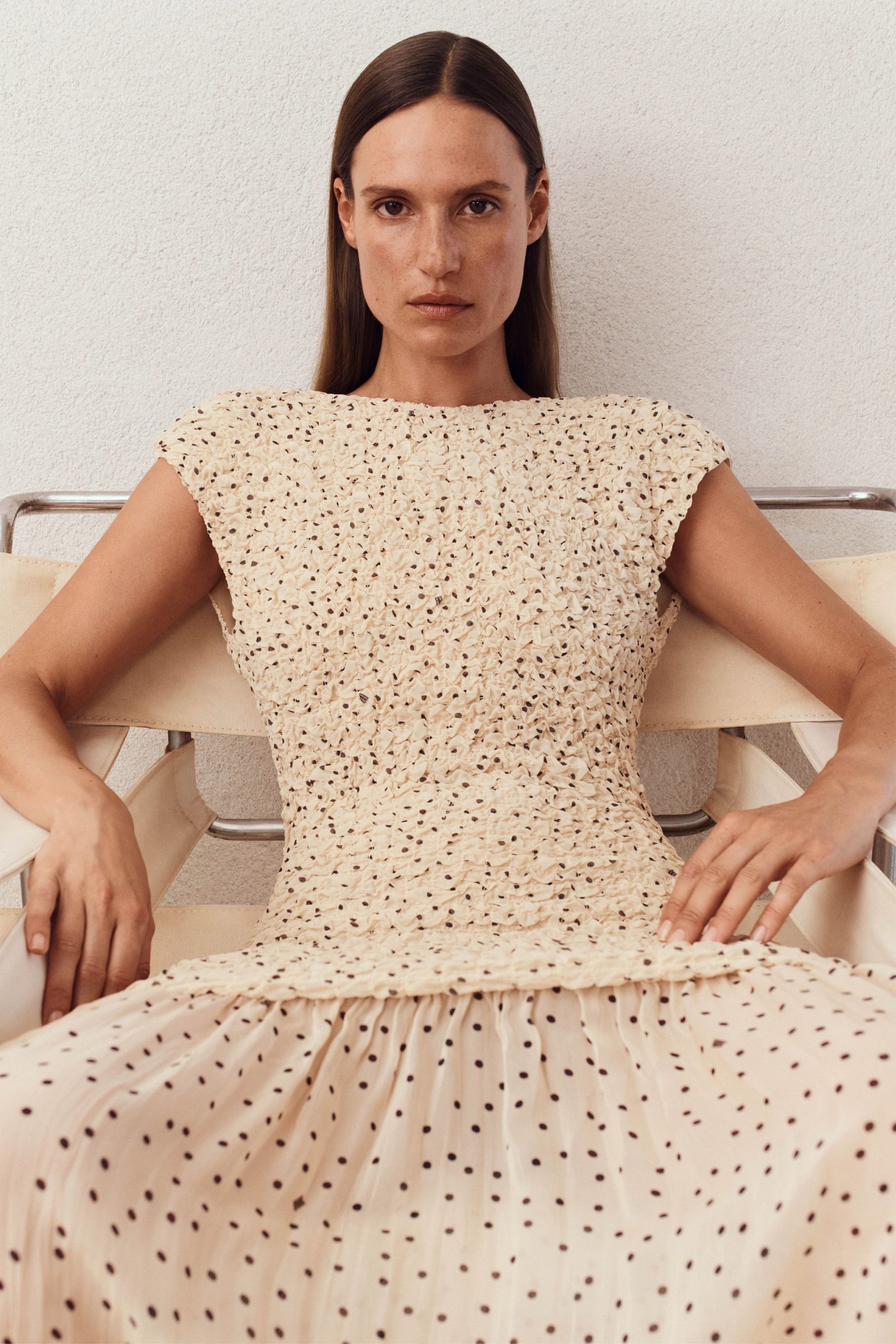 beige polka-dot fitted midi dress