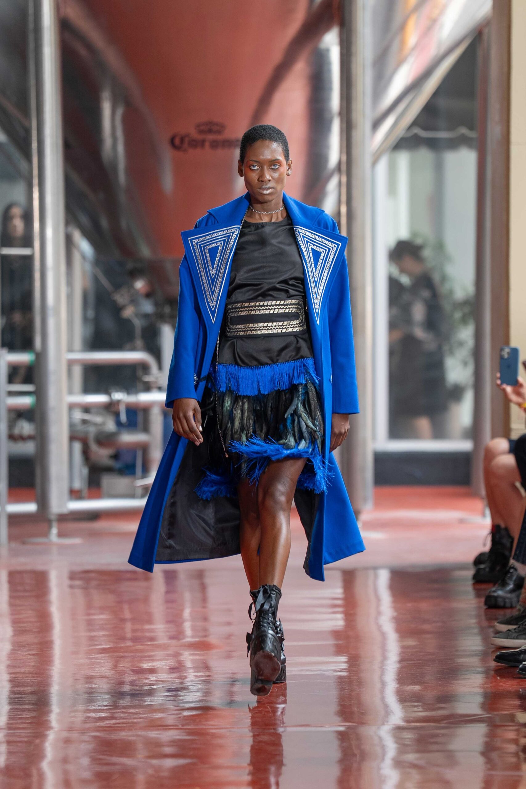 blue coat black top mini skirt