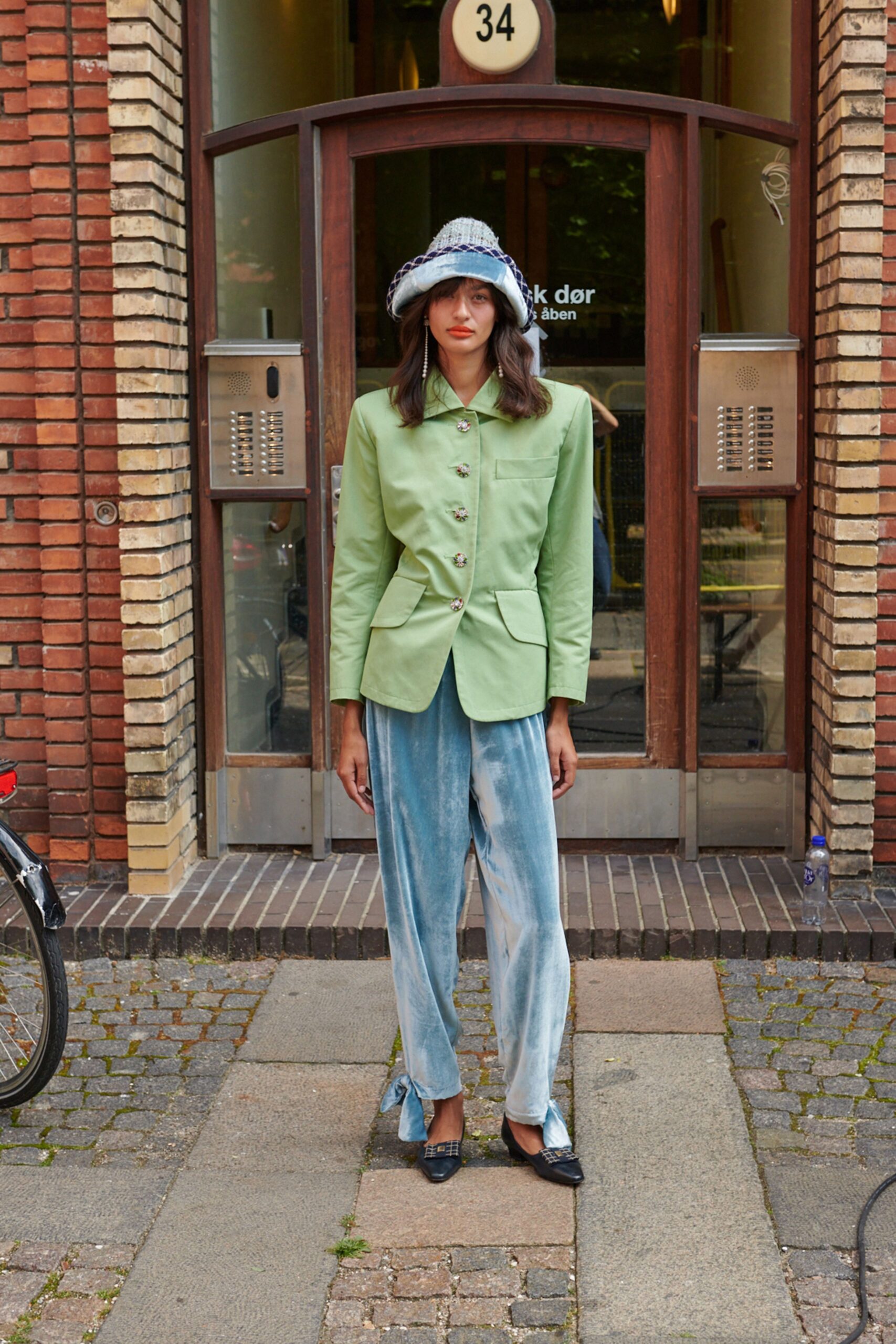 green blazer blue pants