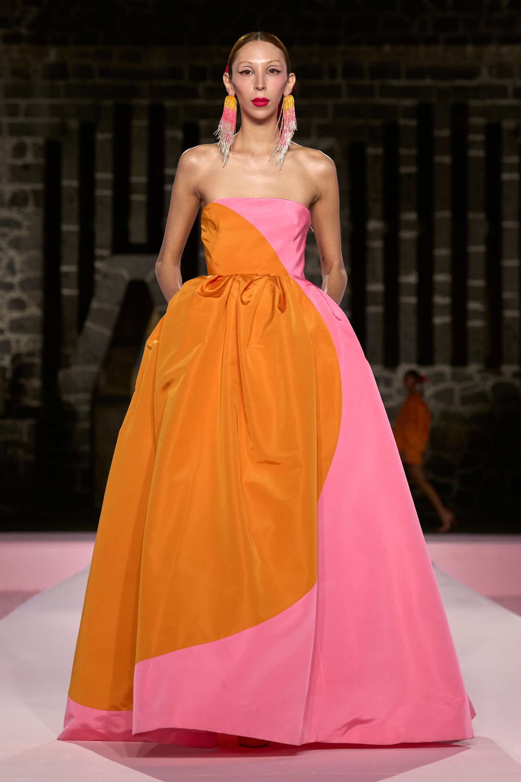 pink and orange strapless gown