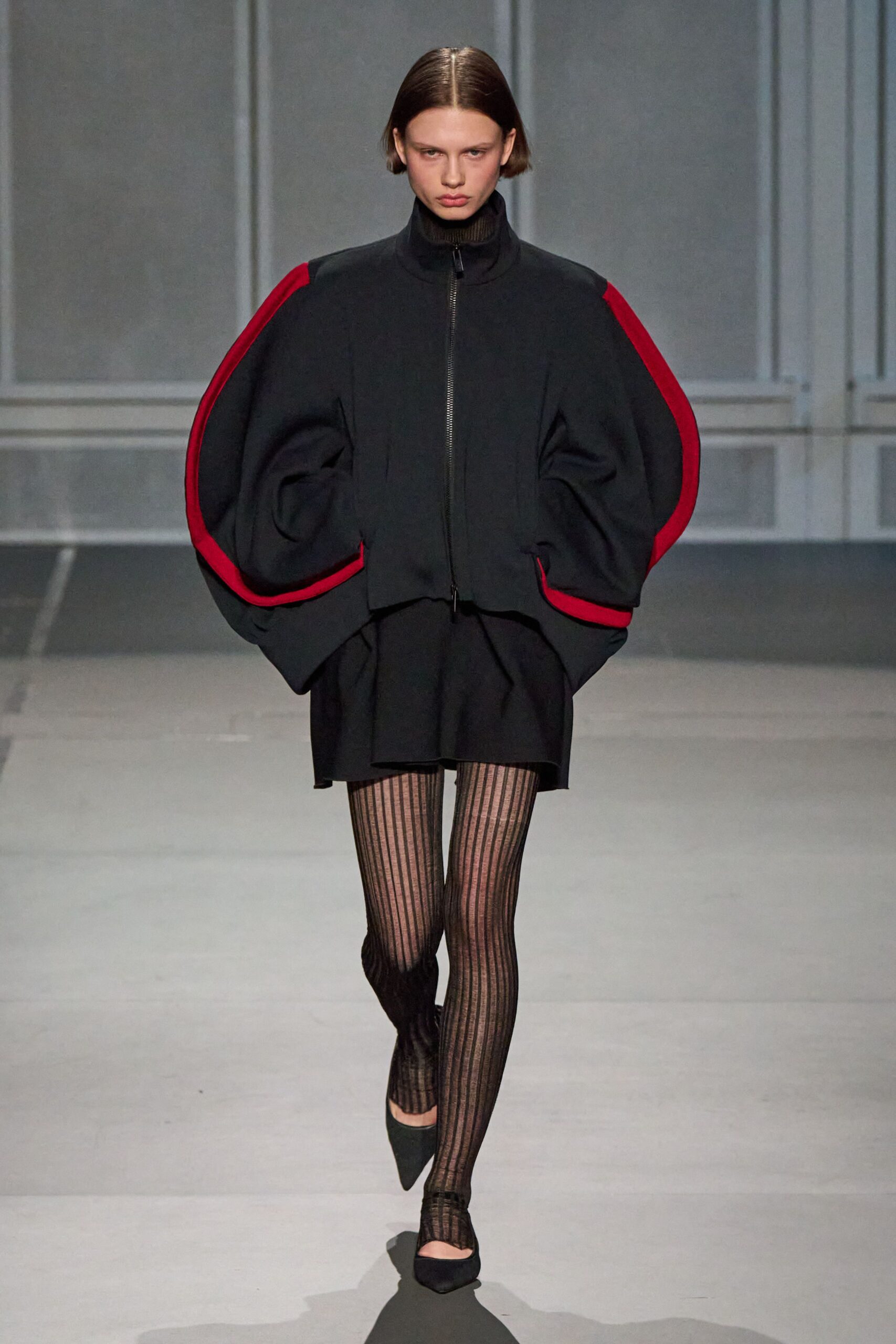 black relaxed jacket with red accents
