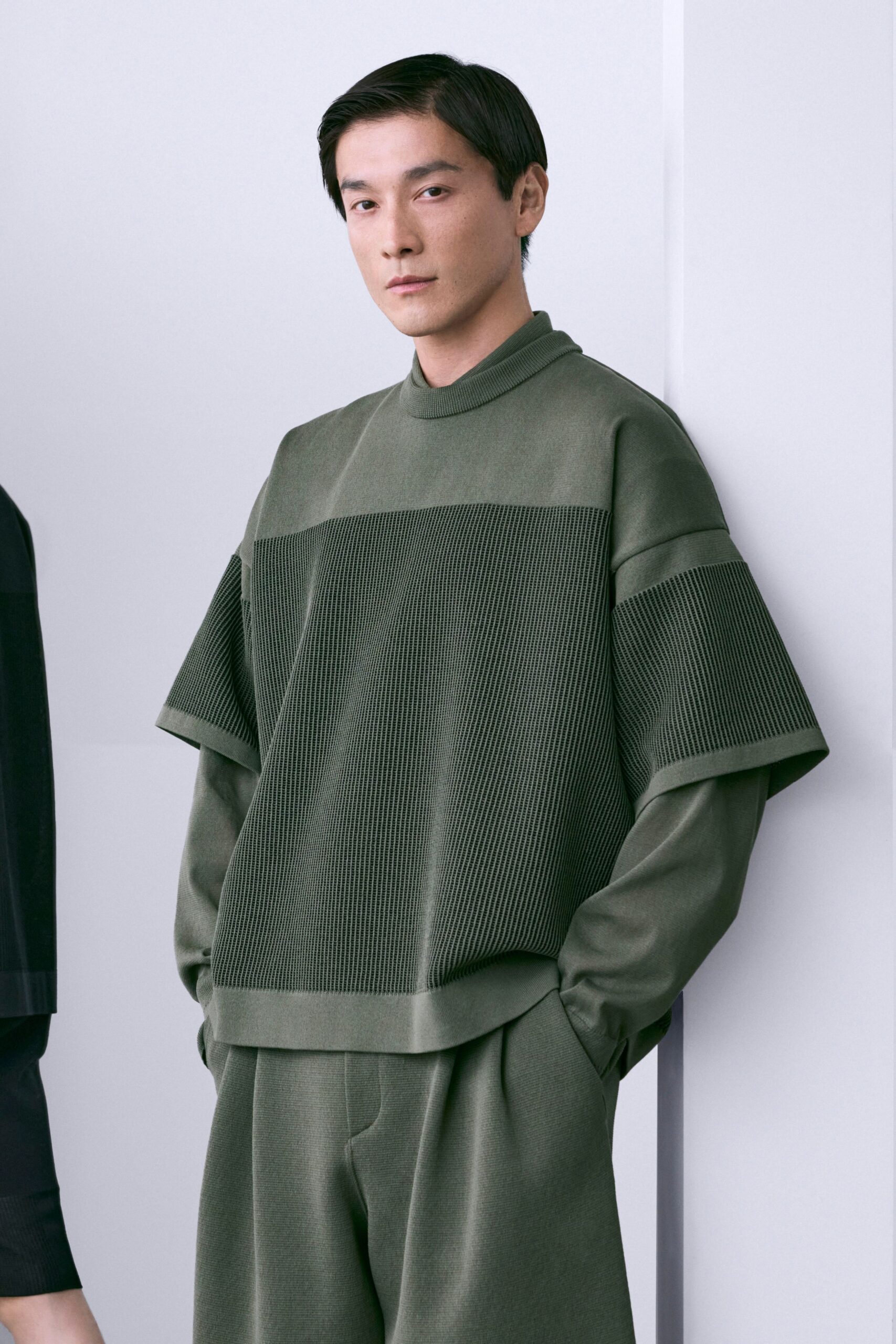 green knit long-sleeve high-neck oversized color-blocked textured top