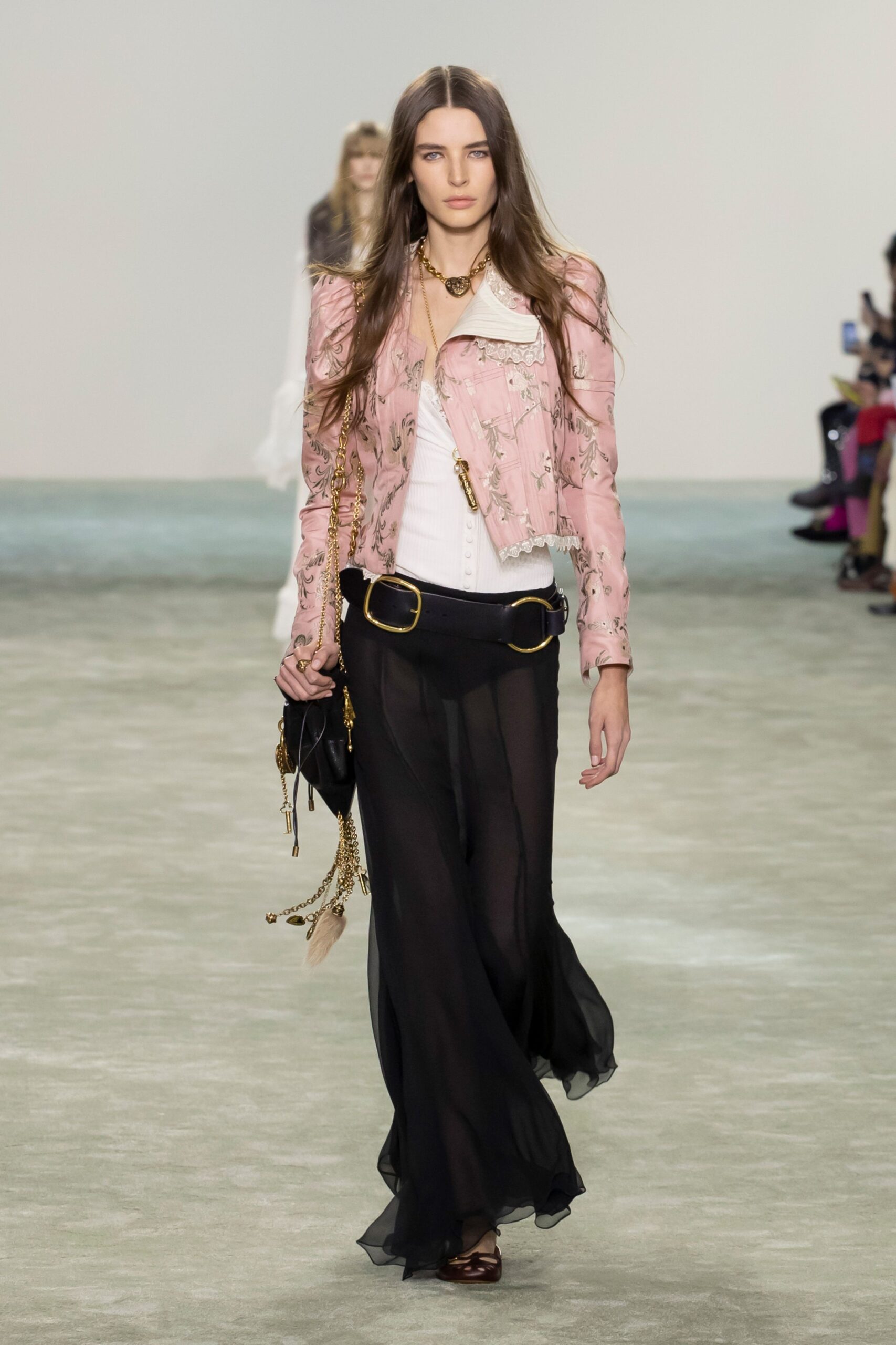 pink leather jacket with black skirt