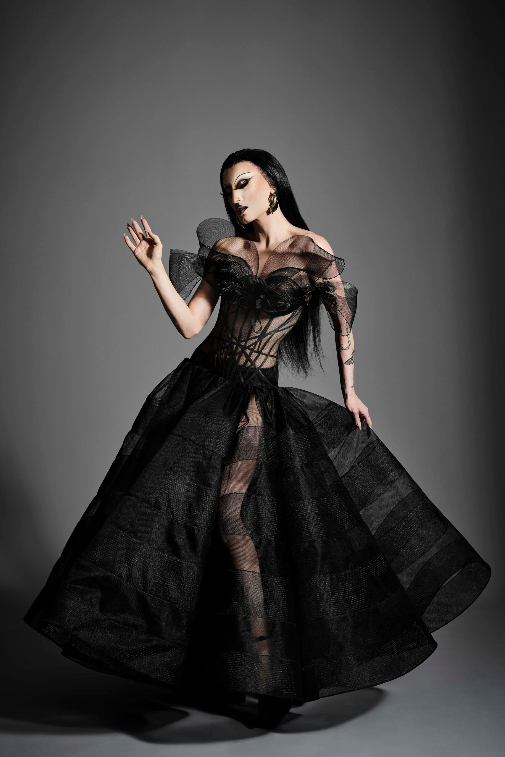 black off-shoulder flowing gown