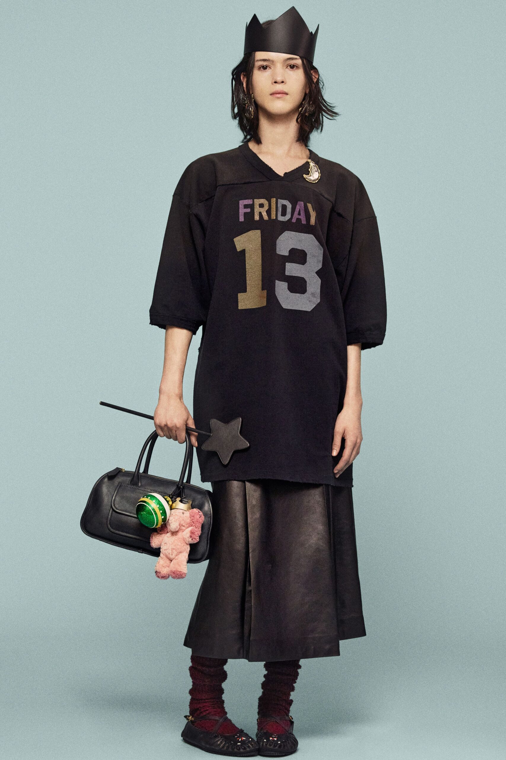 black relaxed dress with leather skirt