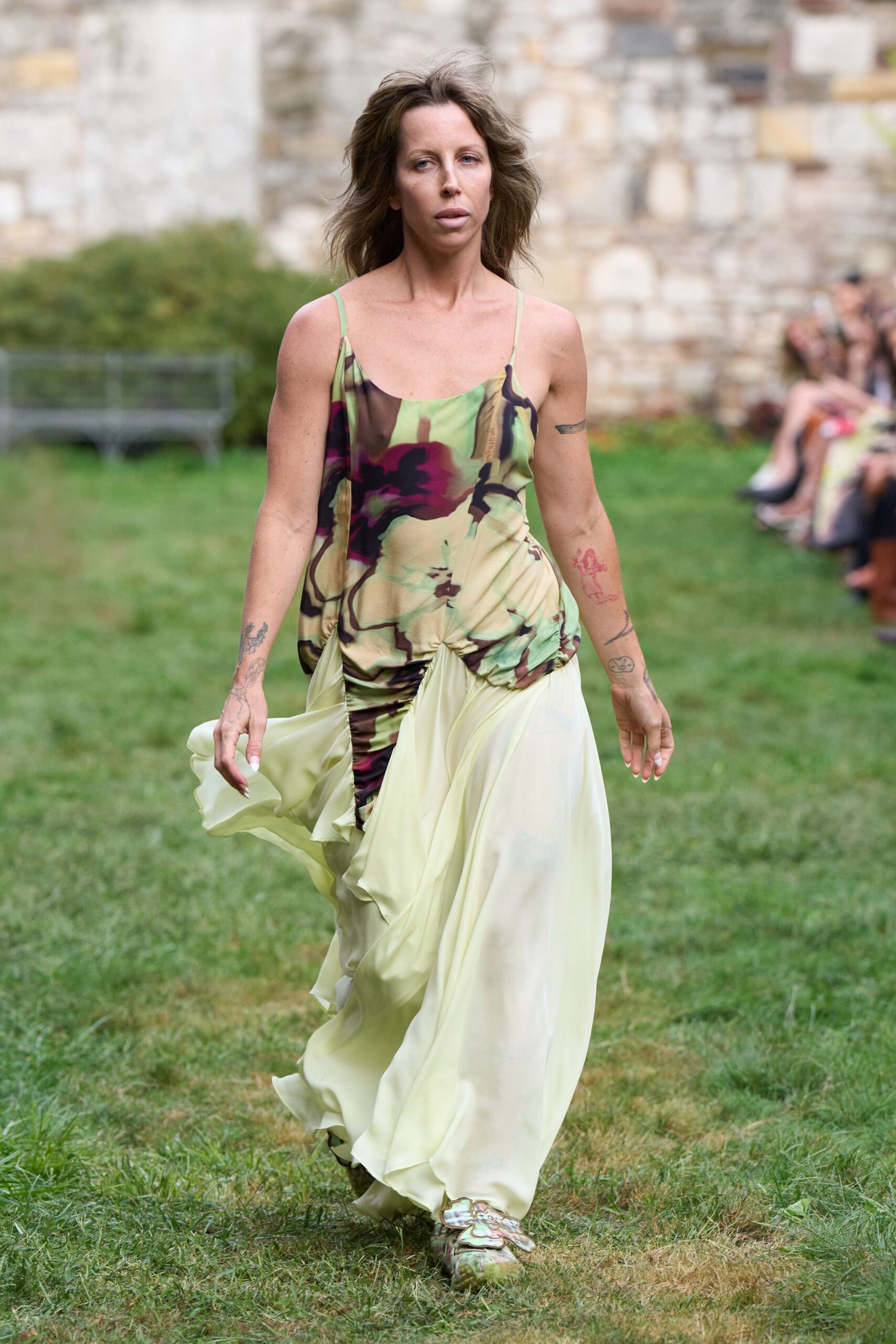 green silk sleeveless v-neck fitted draped flared dress
