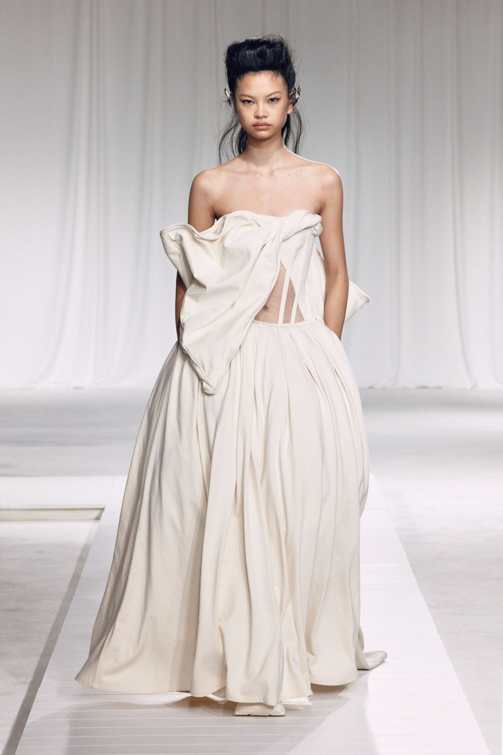 white off-shoulder pleated gown