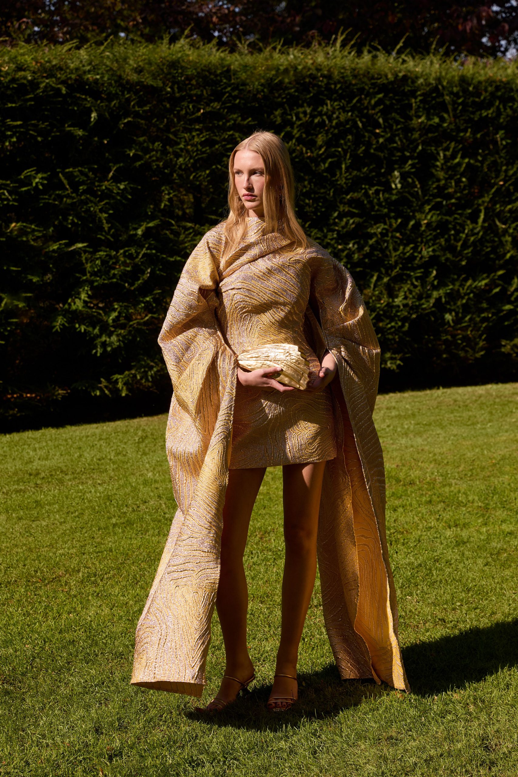 gold silk long-sleeve relaxed draped flowing cape