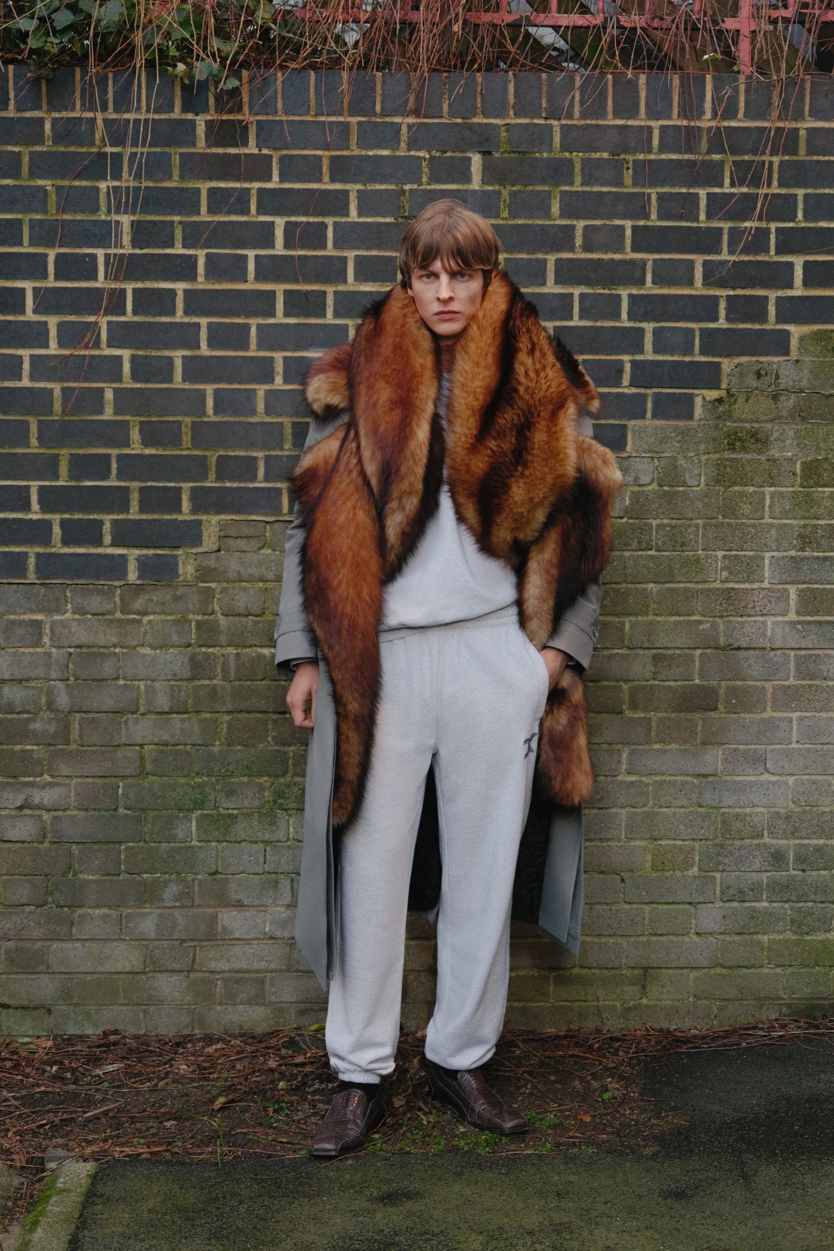 gray faux-fur coat with relaxed sweater