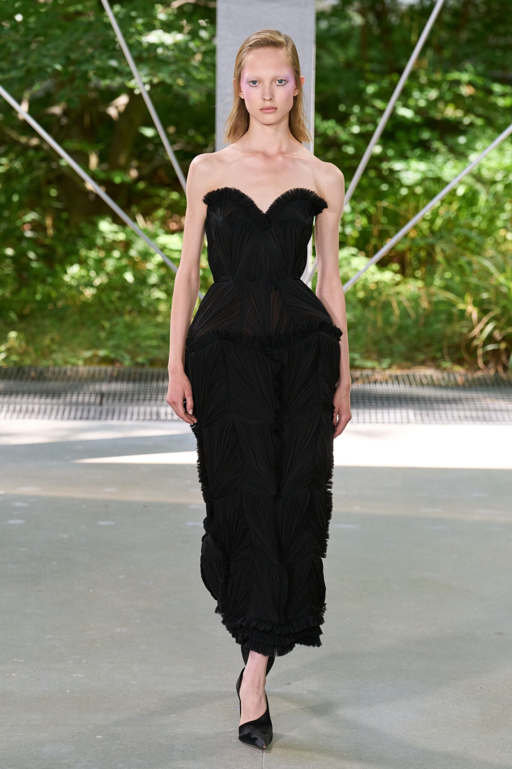 black pleated strapless gown with heels