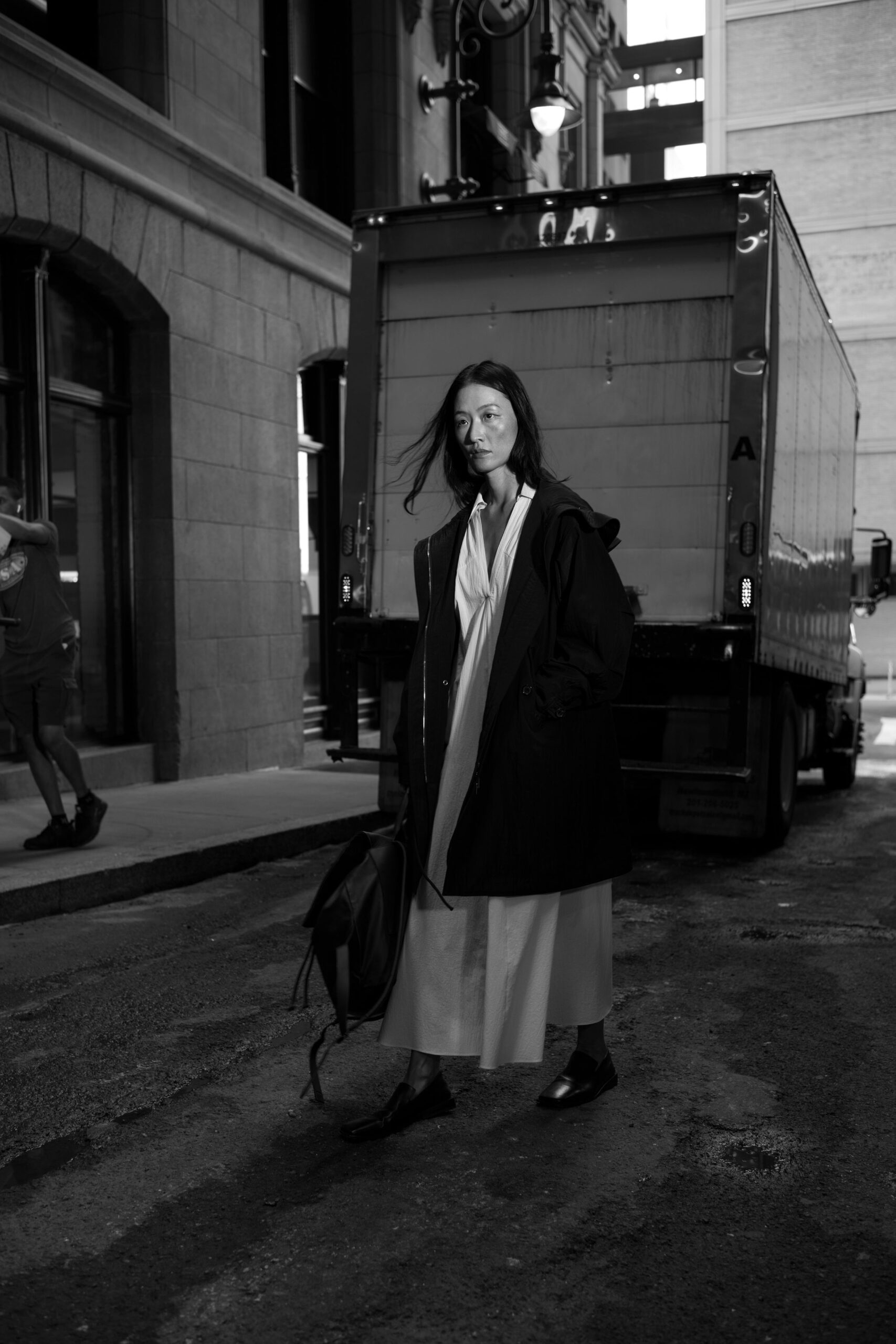 black coat white dress black shoes