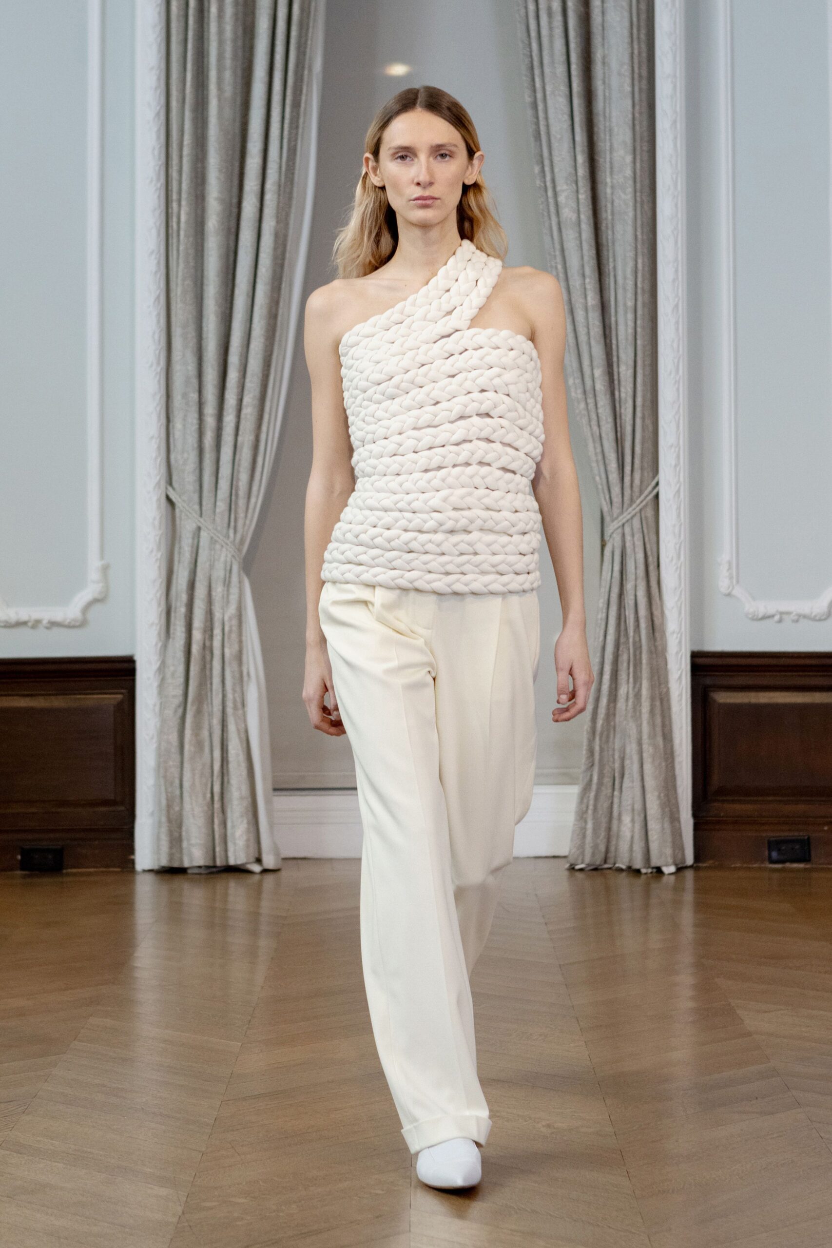 white cotton sleeveless asymmetric fitted textured top